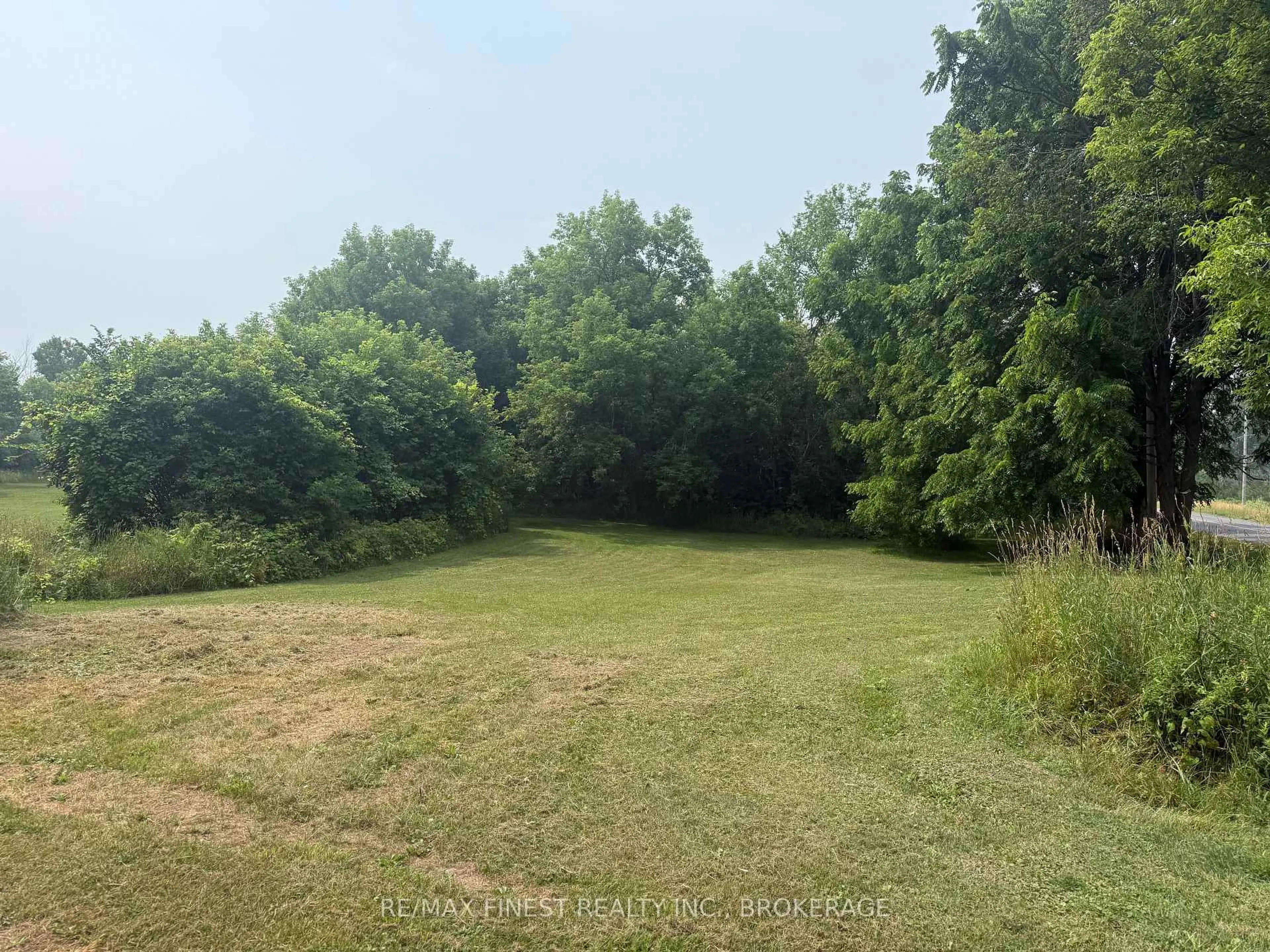 A pic from outside/outdoor area/front of a property/back of a property/a pic from drone, forest/trees view for 2712 Quabbin Rd, Bissett Creek Ontario K0H 2H0