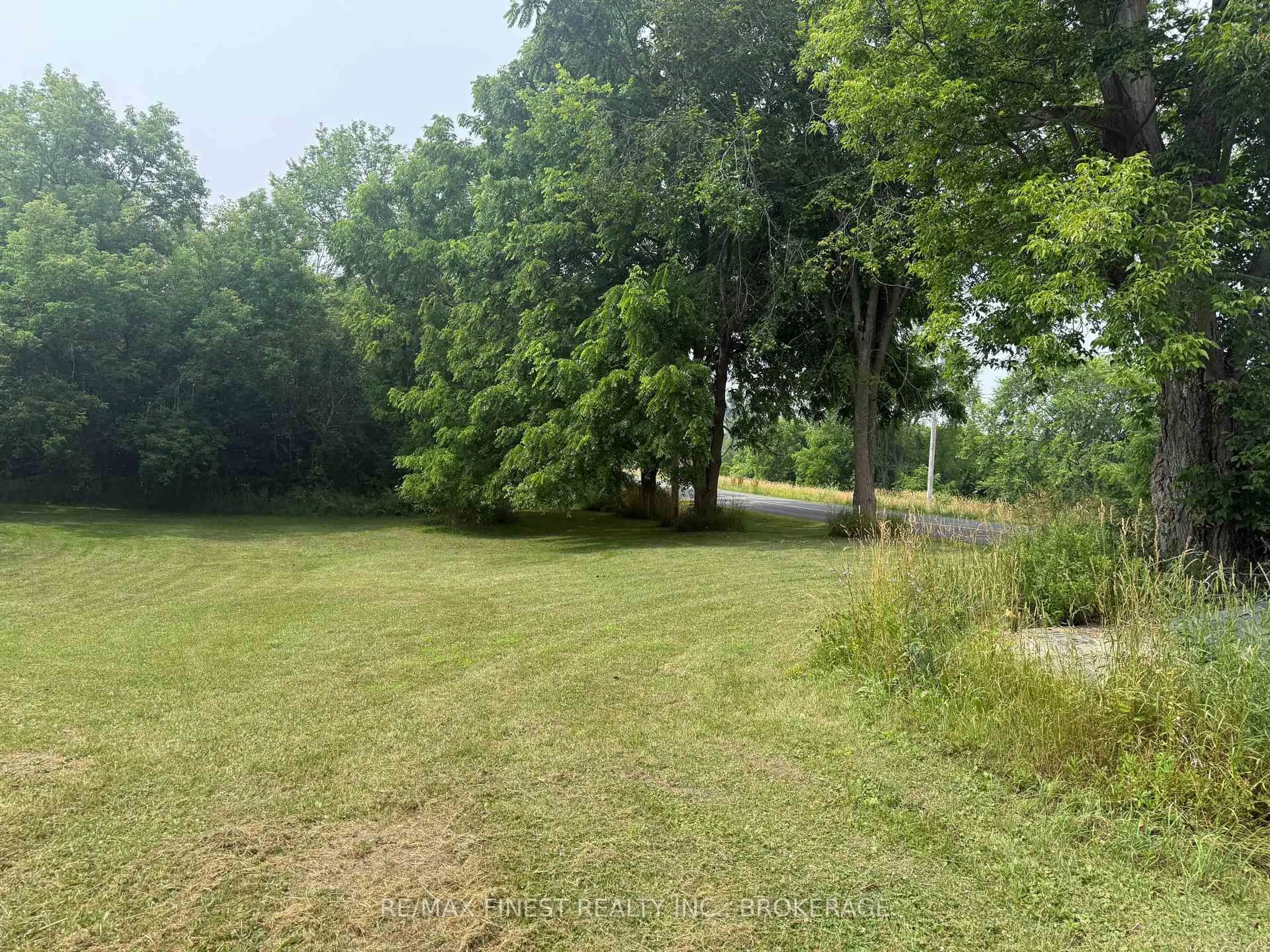 A pic from outside/outdoor area/front of a property/back of a property/a pic from drone, forest/trees view for 2712 Quabbin Rd, Bissett Creek Ontario K0H 2H0
