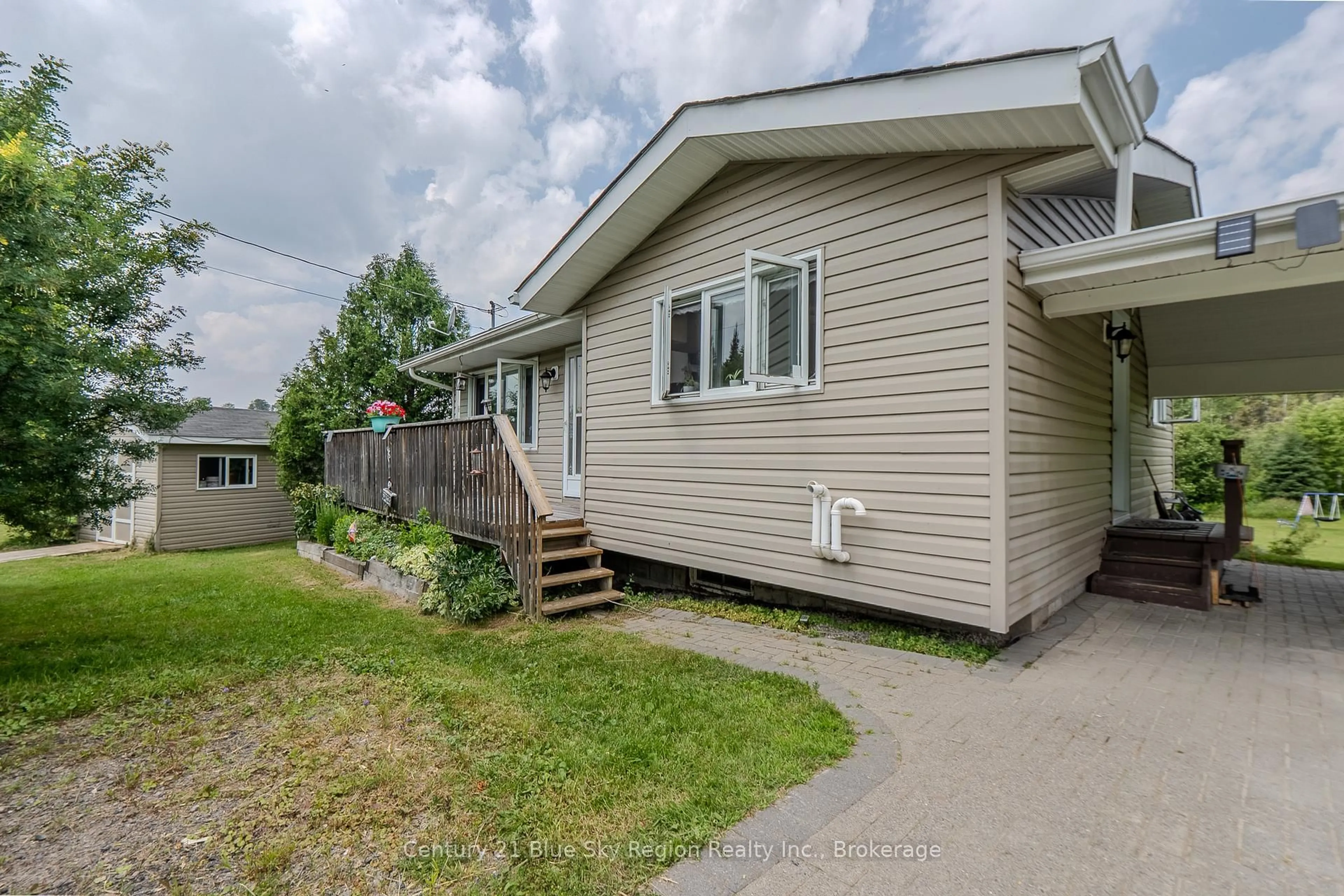 Home with vinyl exterior material, street for 222 Bertha Rd, East Ferris Ontario P0H 1K0