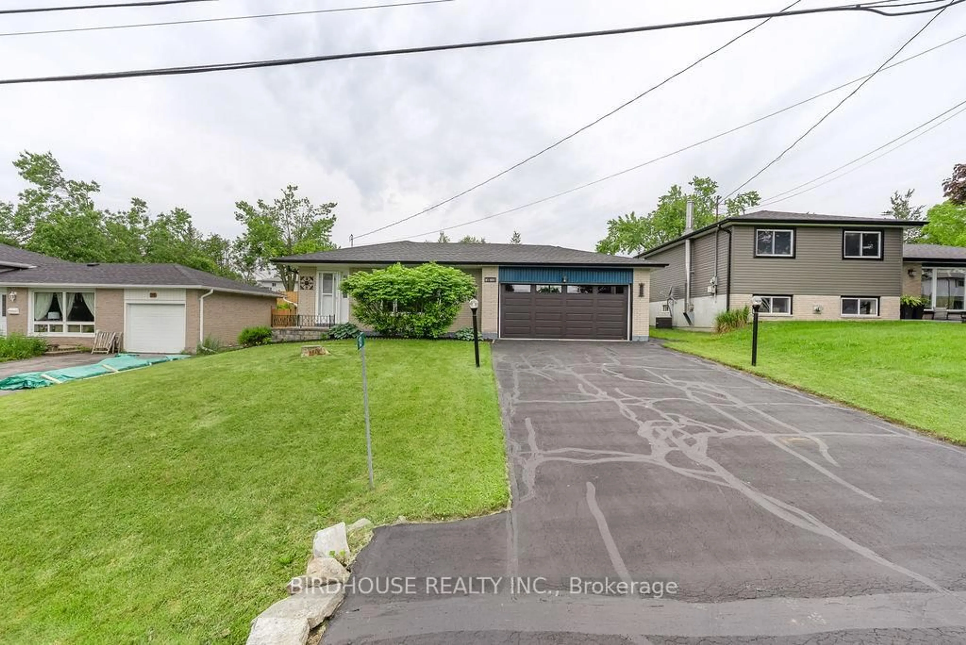 A pic from outside/outdoor area/front of a property/back of a property/a pic from drone, street for 13 Mohawk Dr, Kawartha Lakes Ontario K9V 4R1