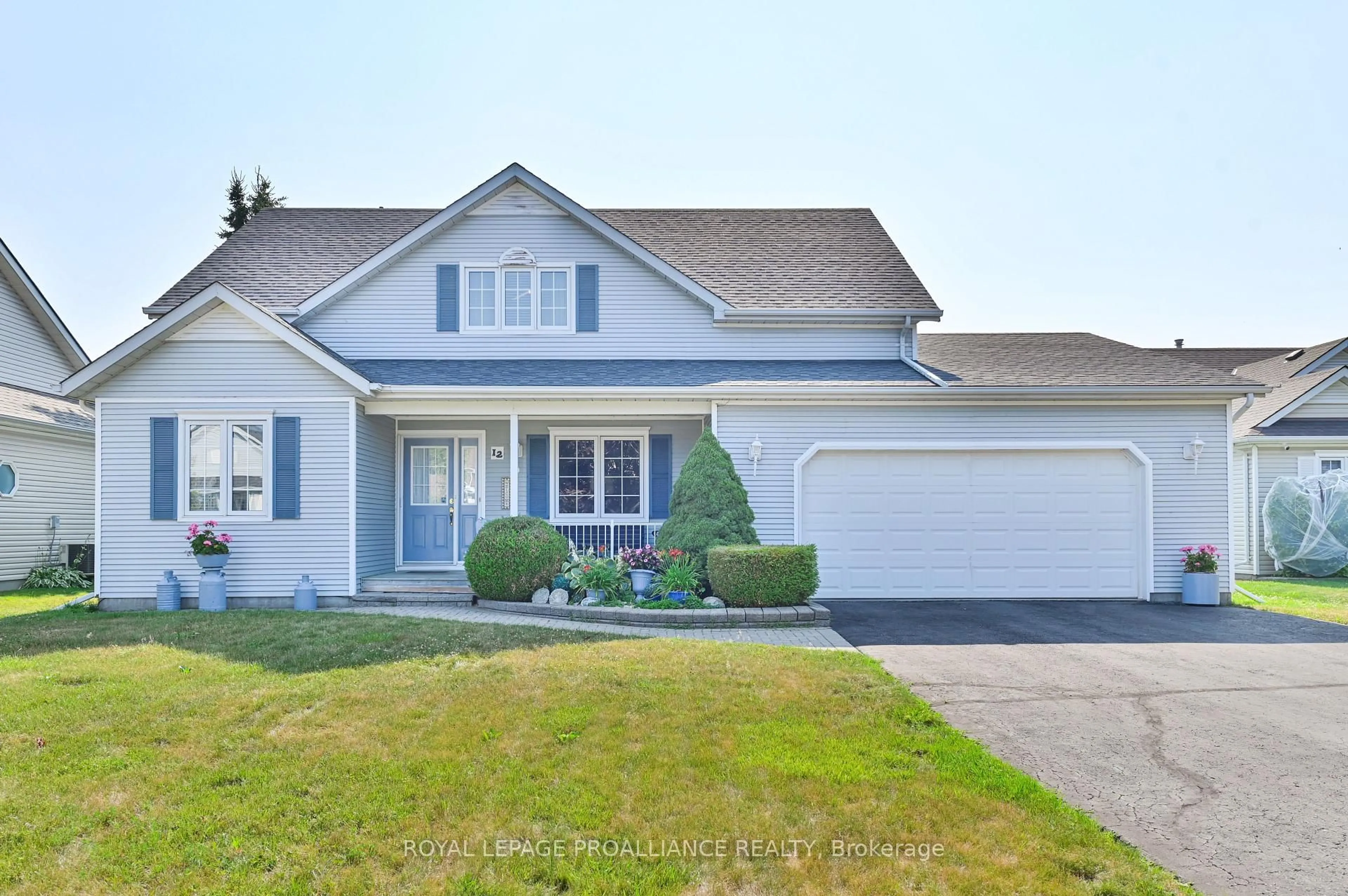 Home with vinyl exterior material, street for 12 Nesbitt Dr, Brighton Ontario K0K 1H0