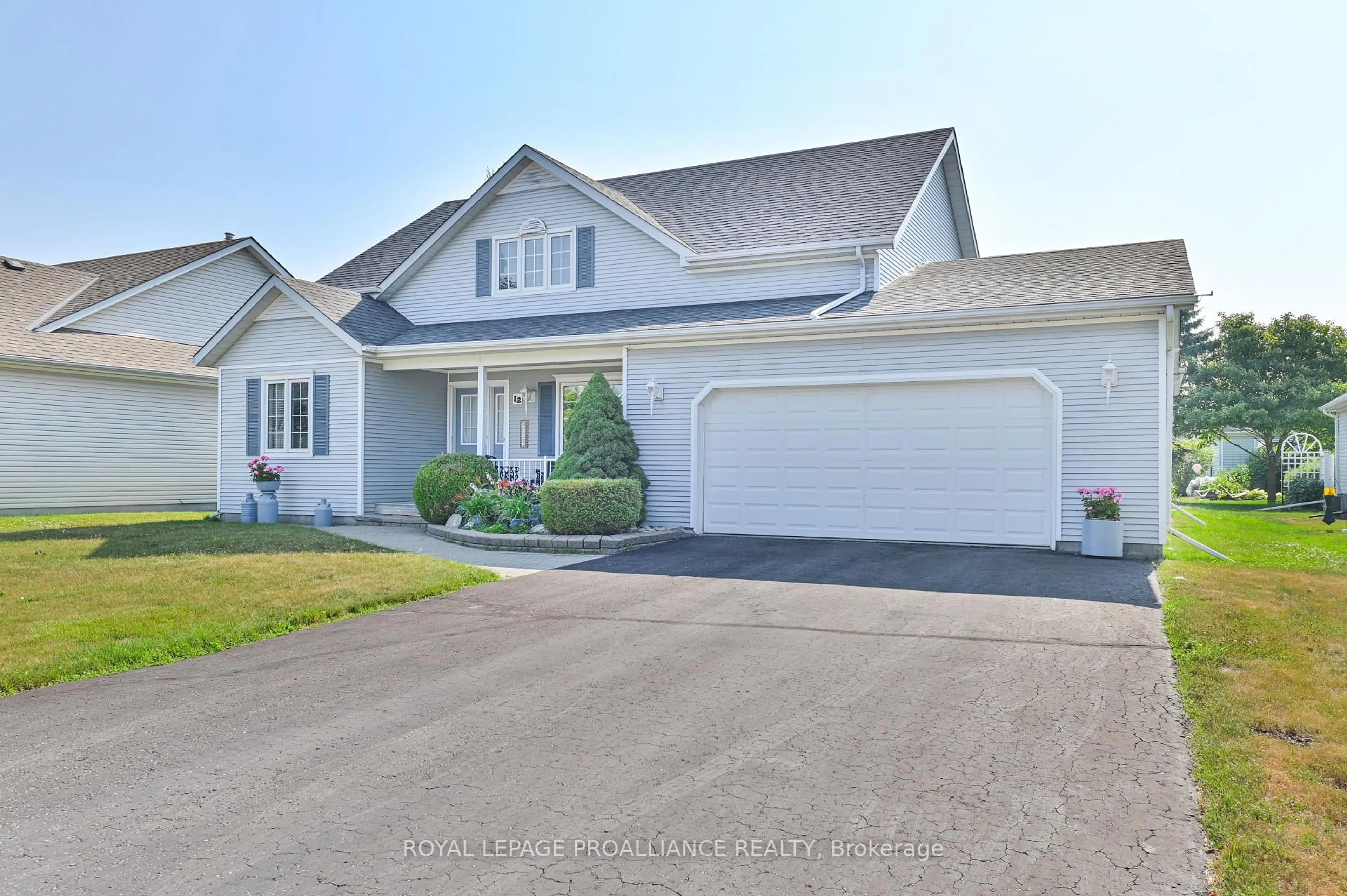 Home with vinyl exterior material, street for 12 Nesbitt Dr, Brighton Ontario K0K 1H0