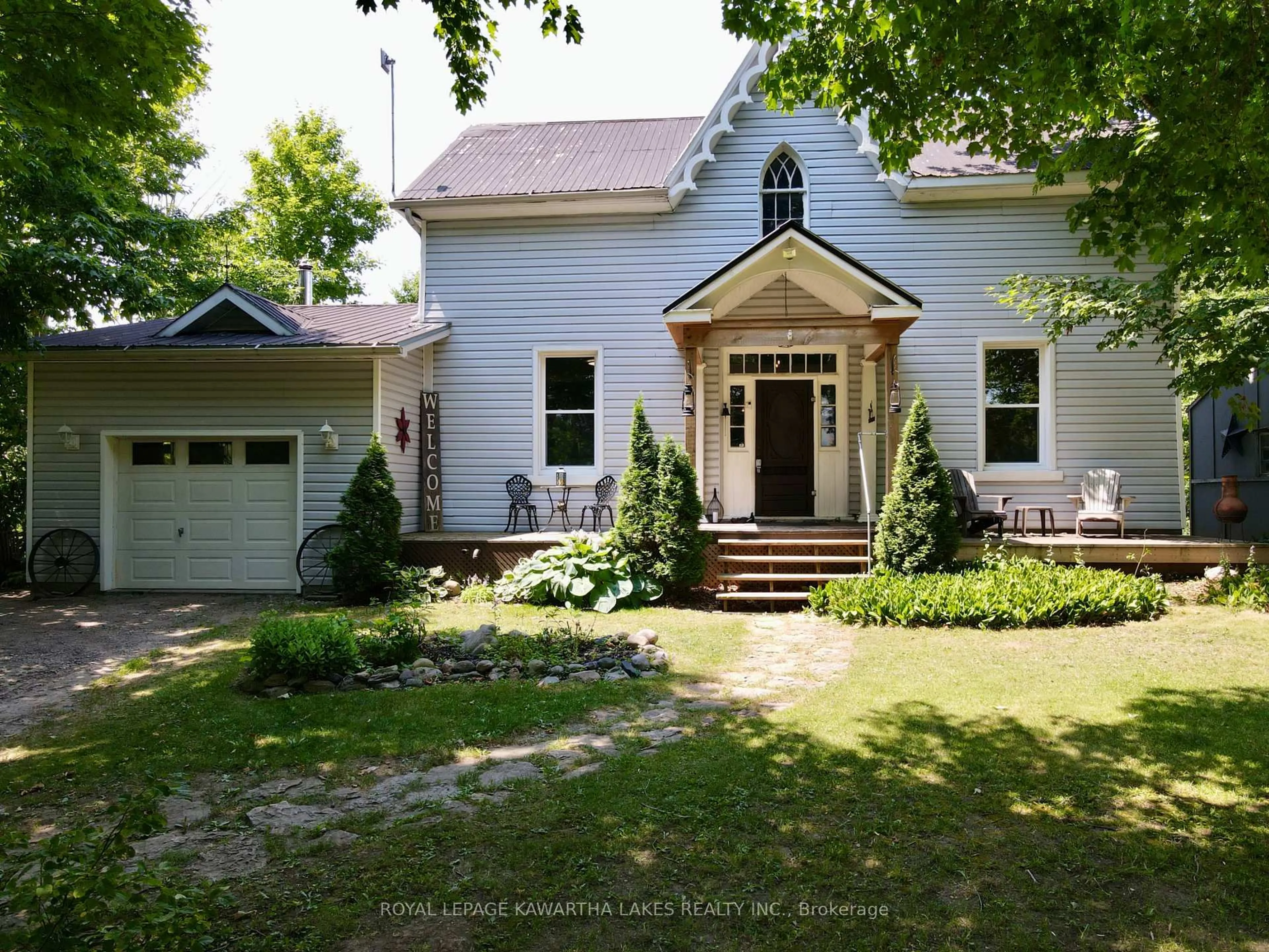 A pic from outside/outdoor area/front of a property/back of a property/a pic from drone, street for 1259 Cnty Rd 46 Rd, Kawartha Lakes Ontario K0M 2T0