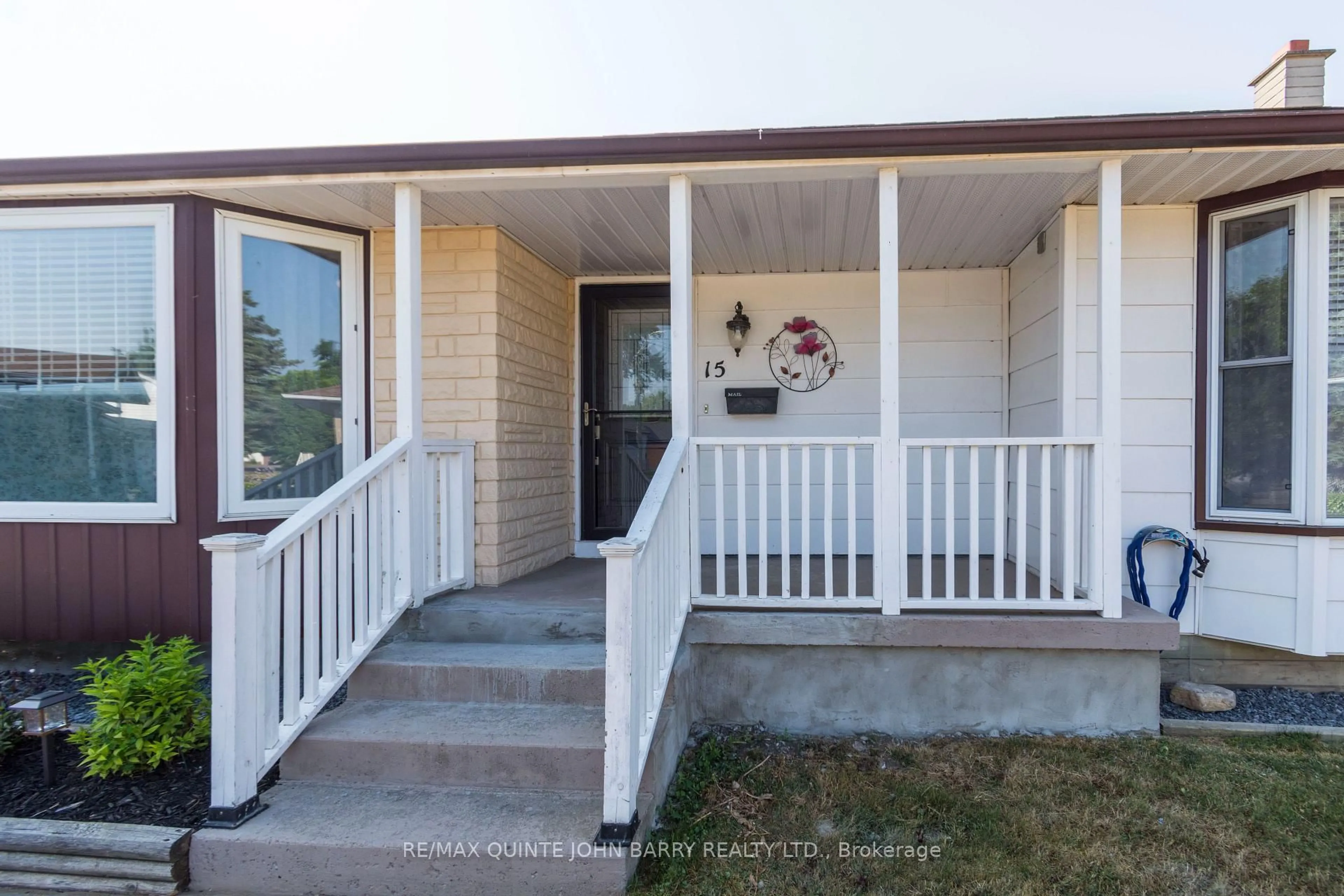 Home with vinyl exterior material, street for 15 Coleman Dr, Quinte West Ontario K8V 3A5