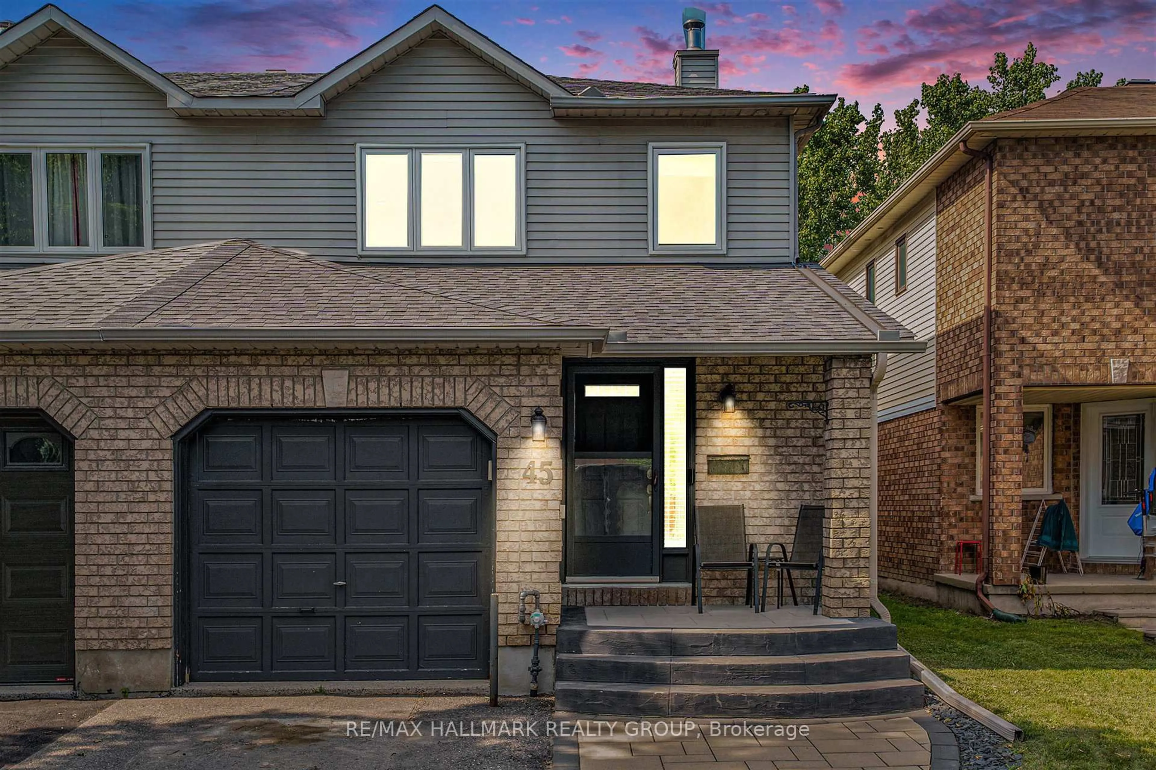 Home with brick exterior material, street for 45 Hunterswood Cres, Ottawa Ontario K1G 5V7