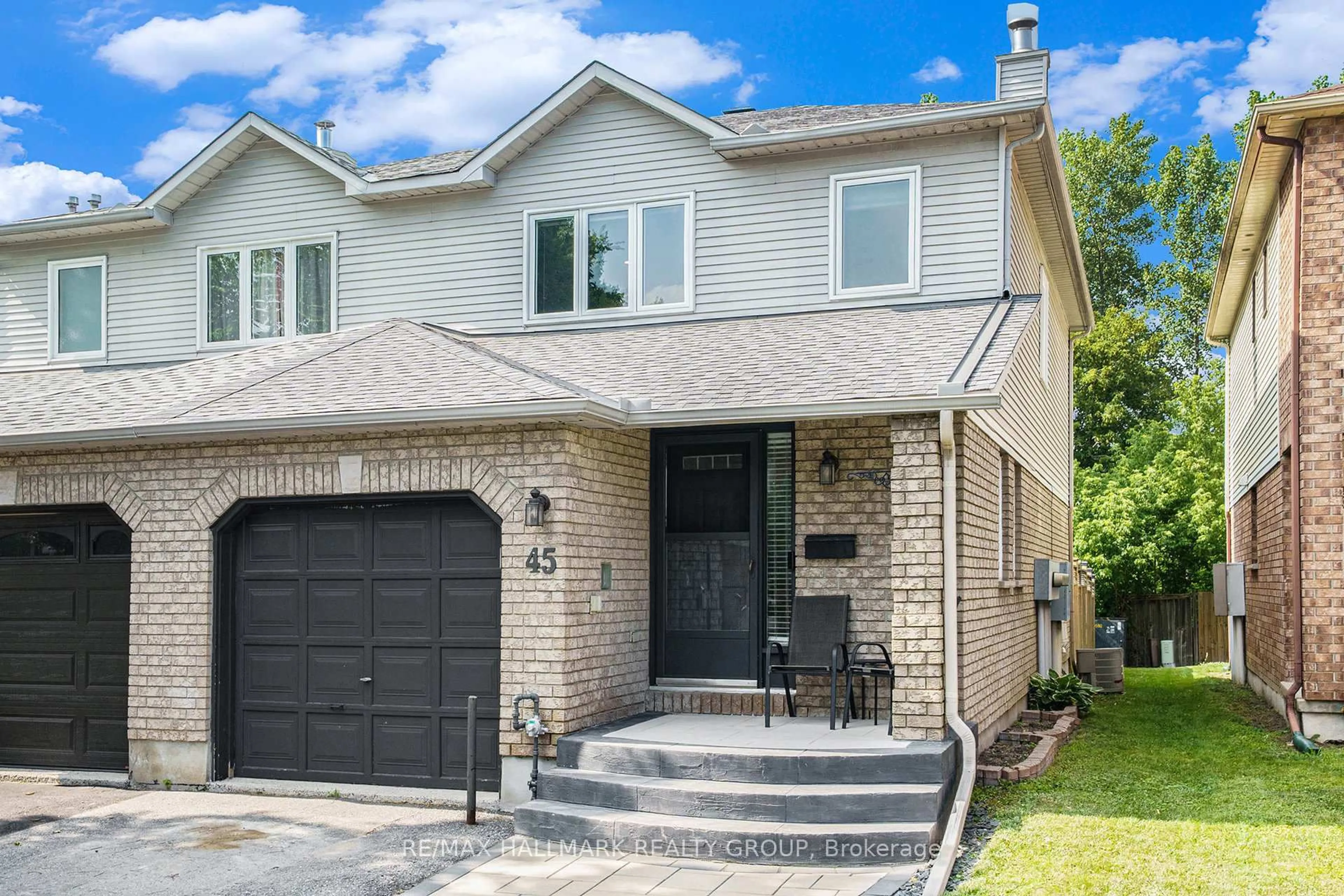 Home with brick exterior material, street for 45 Hunterswood Cres, Ottawa Ontario K1G 5V7