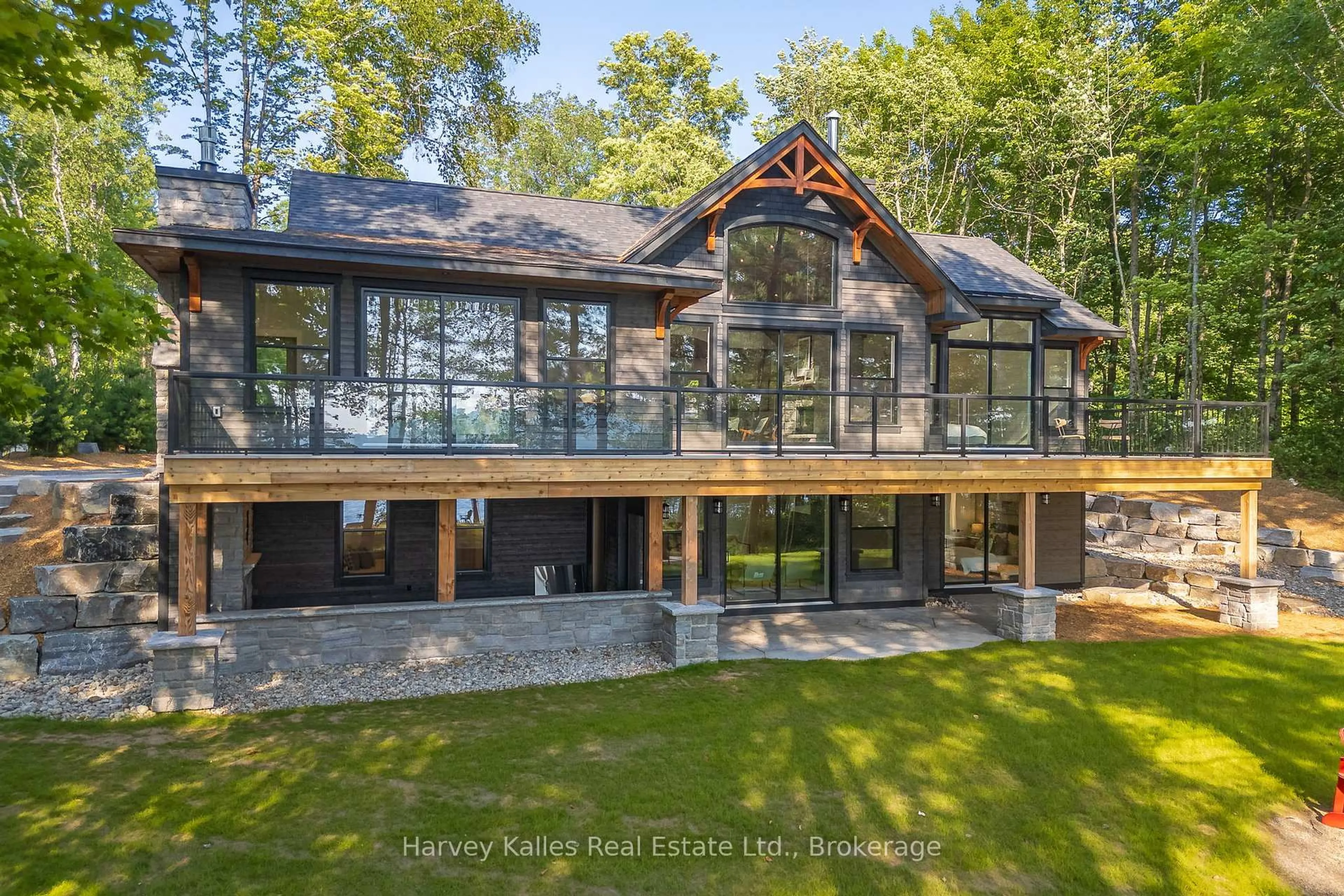 A pic from outside/outdoor area/front of a property/back of a property/a pic from drone, water/lake/river/ocean view for 1204 Seabreeze Rd, Lake of Bays Ontario P0A 1H0