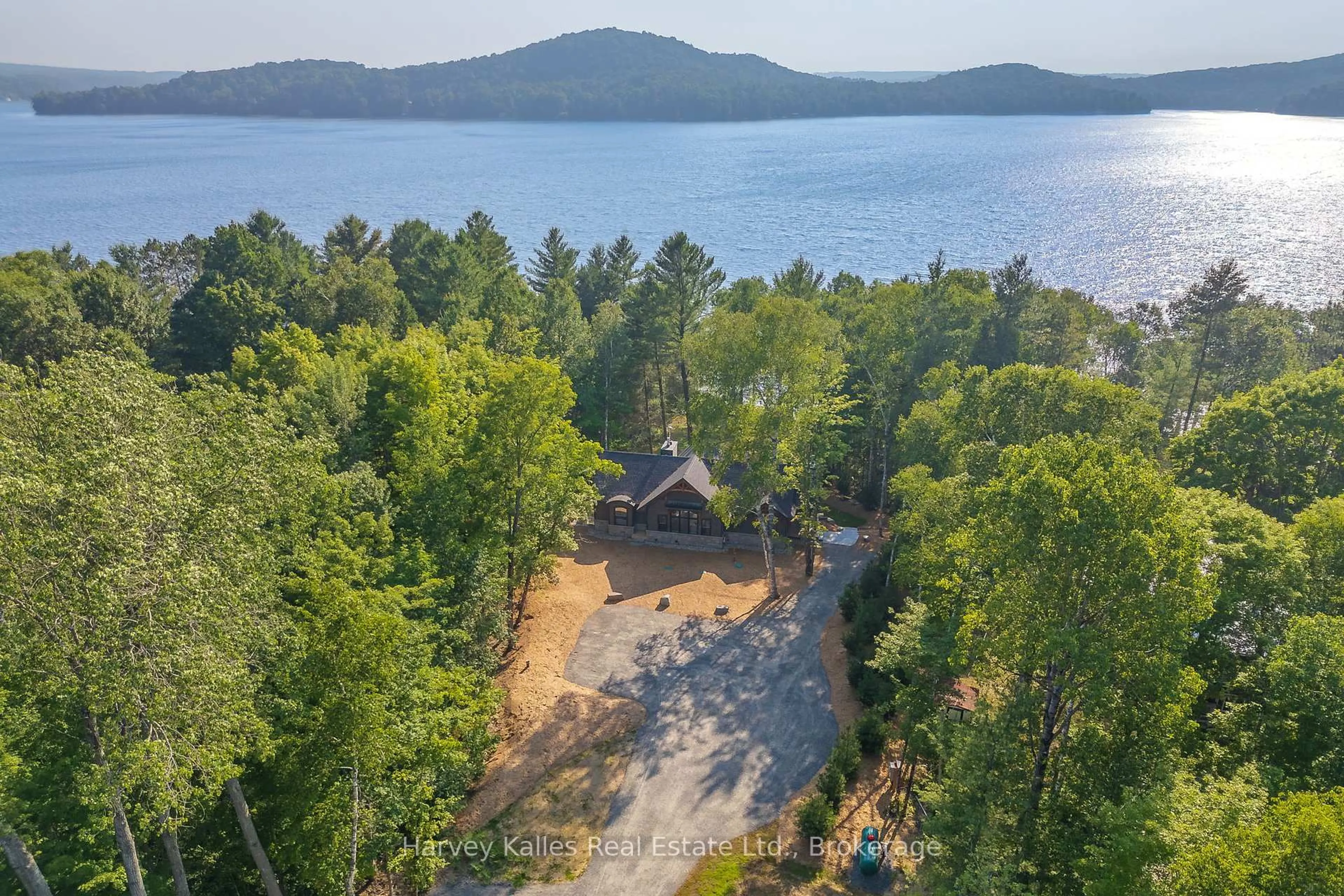 A pic from outside/outdoor area/front of a property/back of a property/a pic from drone, water/lake/river/ocean view for 1204 Seabreeze Rd, Lake of Bays Ontario P0A 1H0