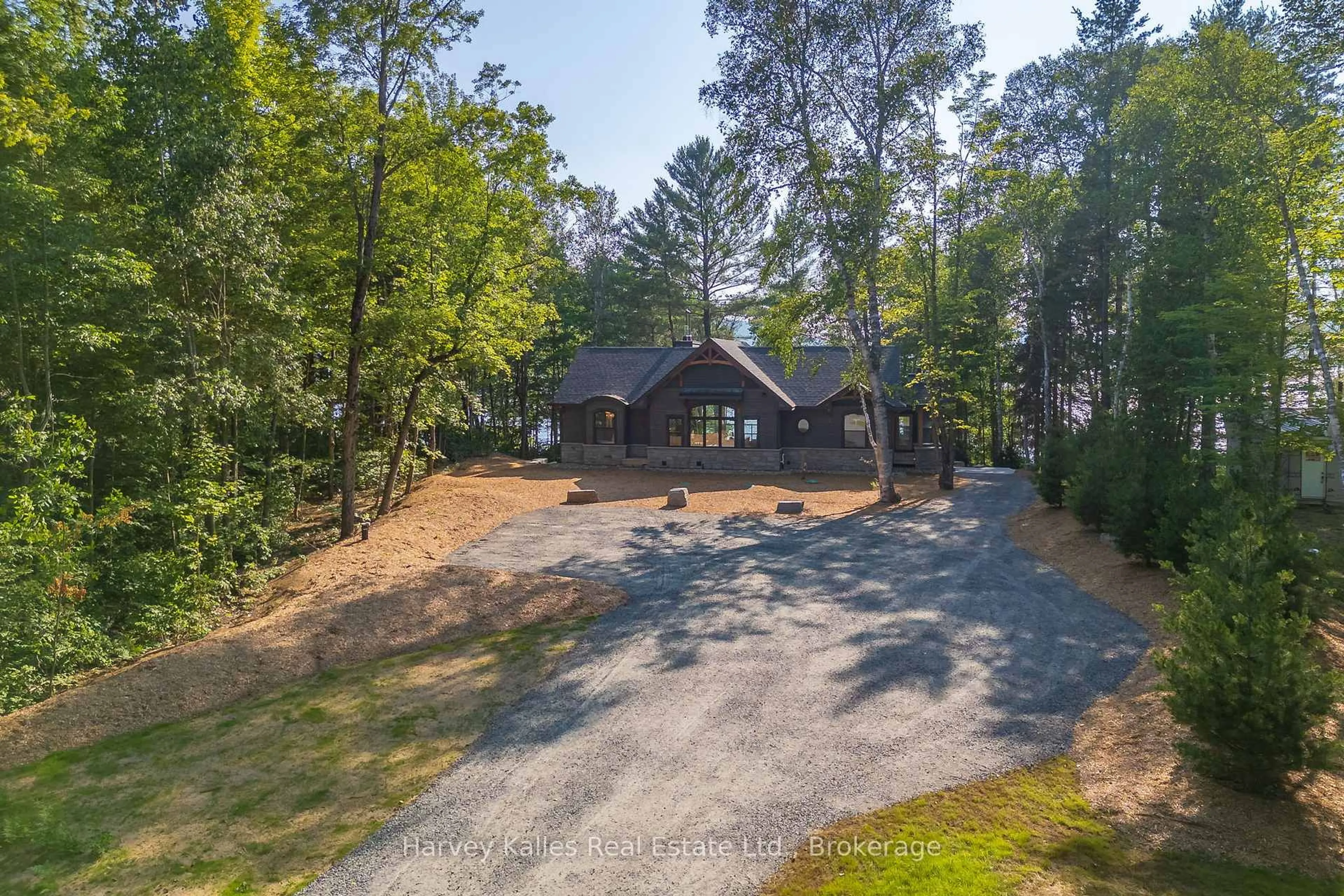 A pic from outside/outdoor area/front of a property/back of a property/a pic from drone, forest/trees view for 1204 Seabreeze Rd, Lake of Bays Ontario P0A 1H0