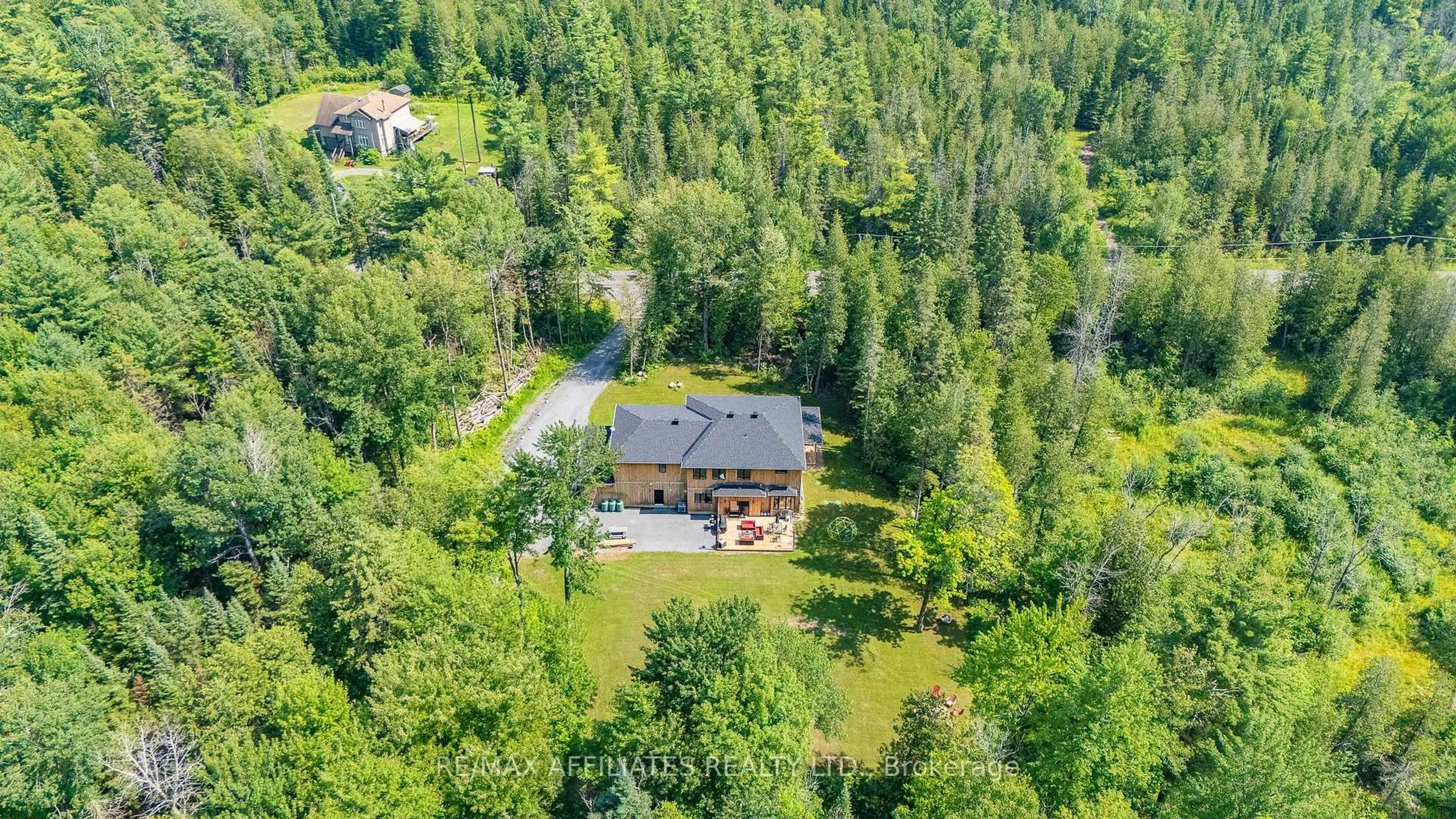 A pic from outside/outdoor area/front of a property/back of a property/a pic from drone, forest/trees view for 150 Maclarens Side Rd, Ottawa Ontario K0A 3M0