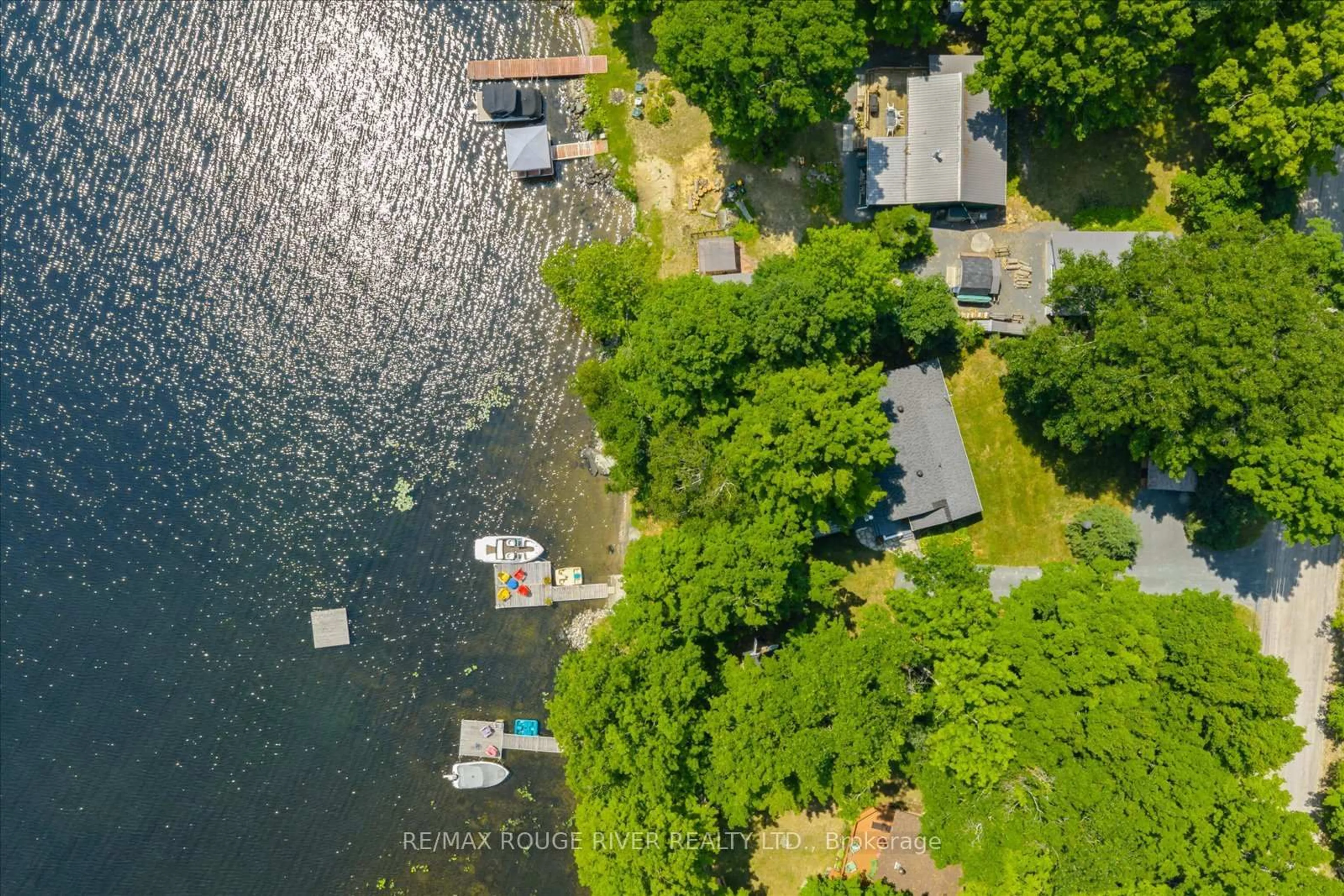 A pic from outside/outdoor area/front of a property/back of a property/a pic from drone, water/lake/river/ocean view for 1097 Cook Rd, Marmora and Lake Ontario K0Z 2M0
