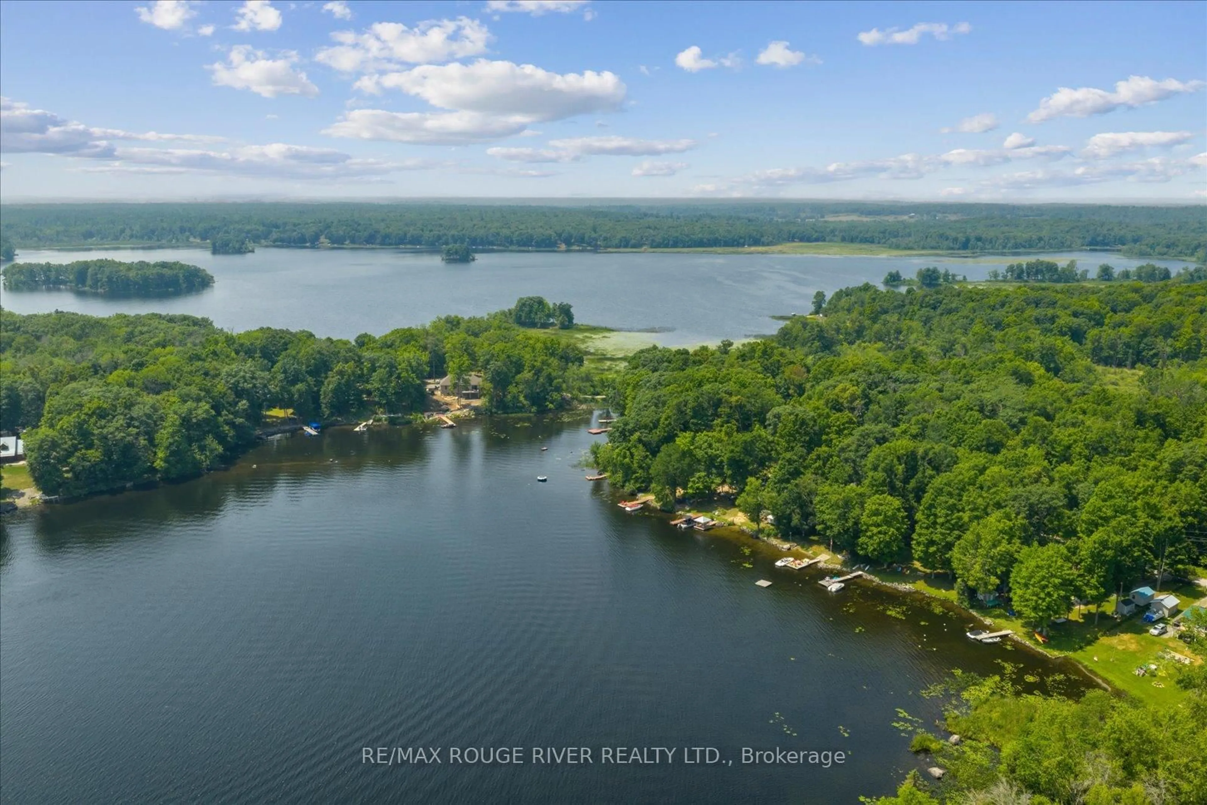 A pic from outside/outdoor area/front of a property/back of a property/a pic from drone, water/lake/river/ocean view for 1097 Cook Rd, Marmora and Lake Ontario K0Z 2M0