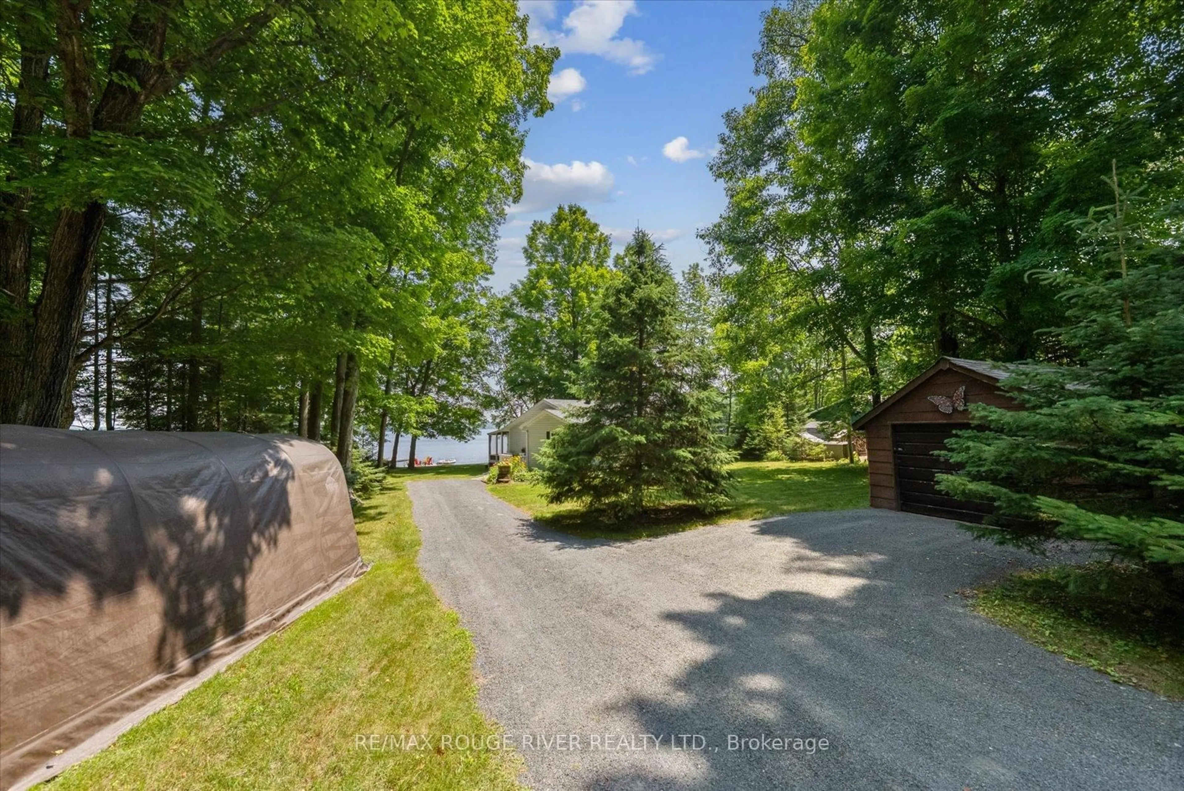 A pic from outside/outdoor area/front of a property/back of a property/a pic from drone, water/lake/river/ocean view for 1097 Cook Rd, Marmora and Lake Ontario K0Z 2M0