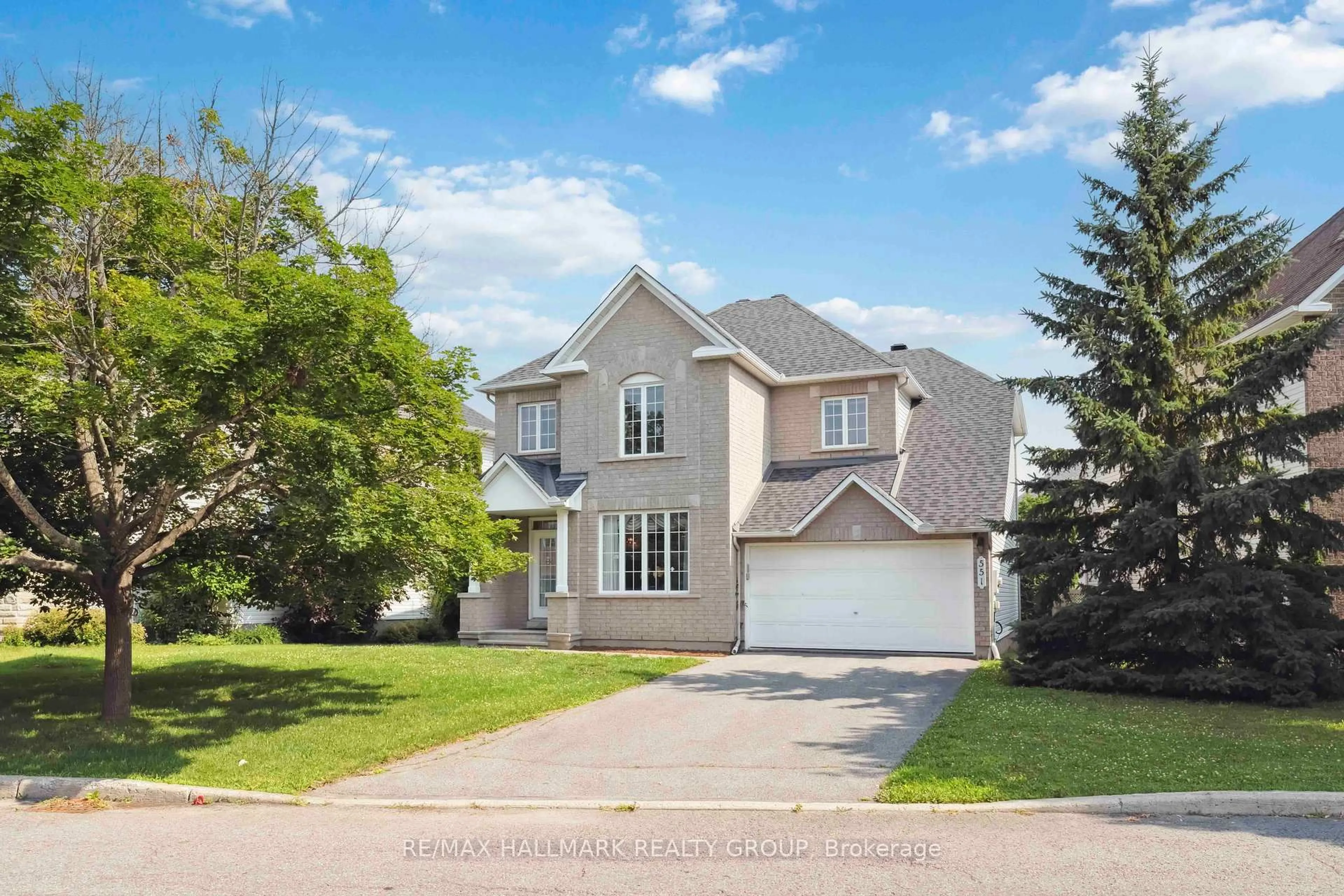 Home with vinyl exterior material, street for 551 Chardonnay Dr, Orleans Ontario K4A 4G7