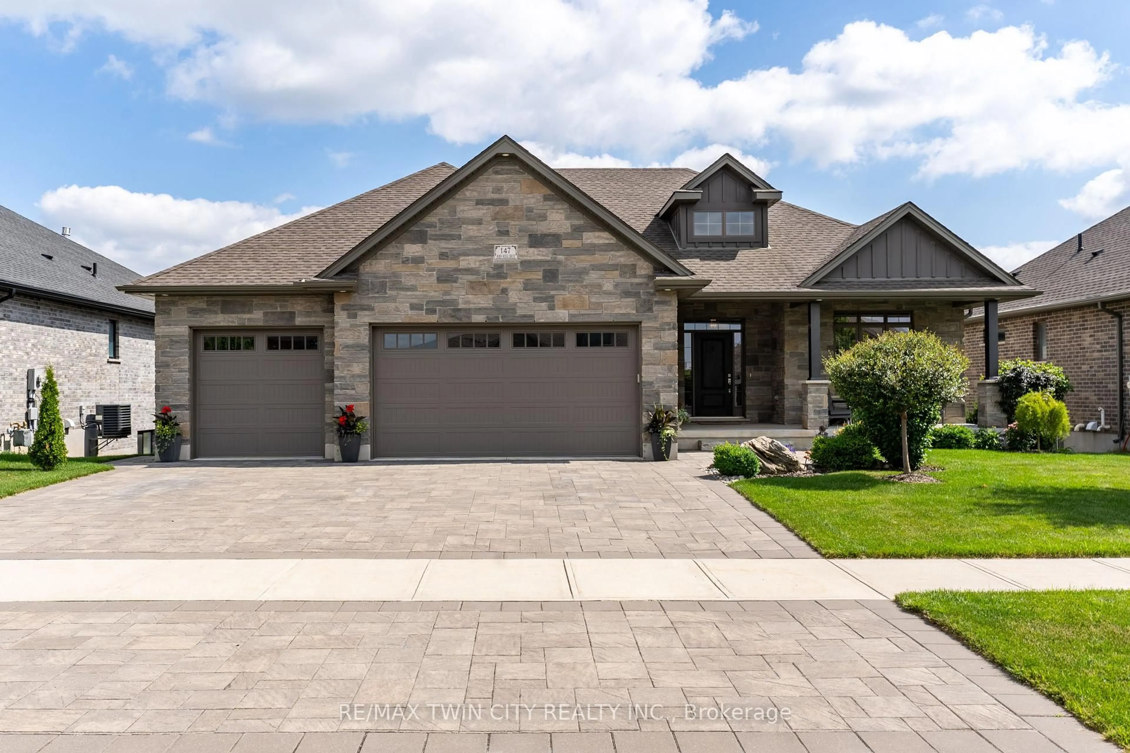 Home with brick exterior material, street for 147 Robin Ridge Dr, Central Elgin Ontario N0L 1B0