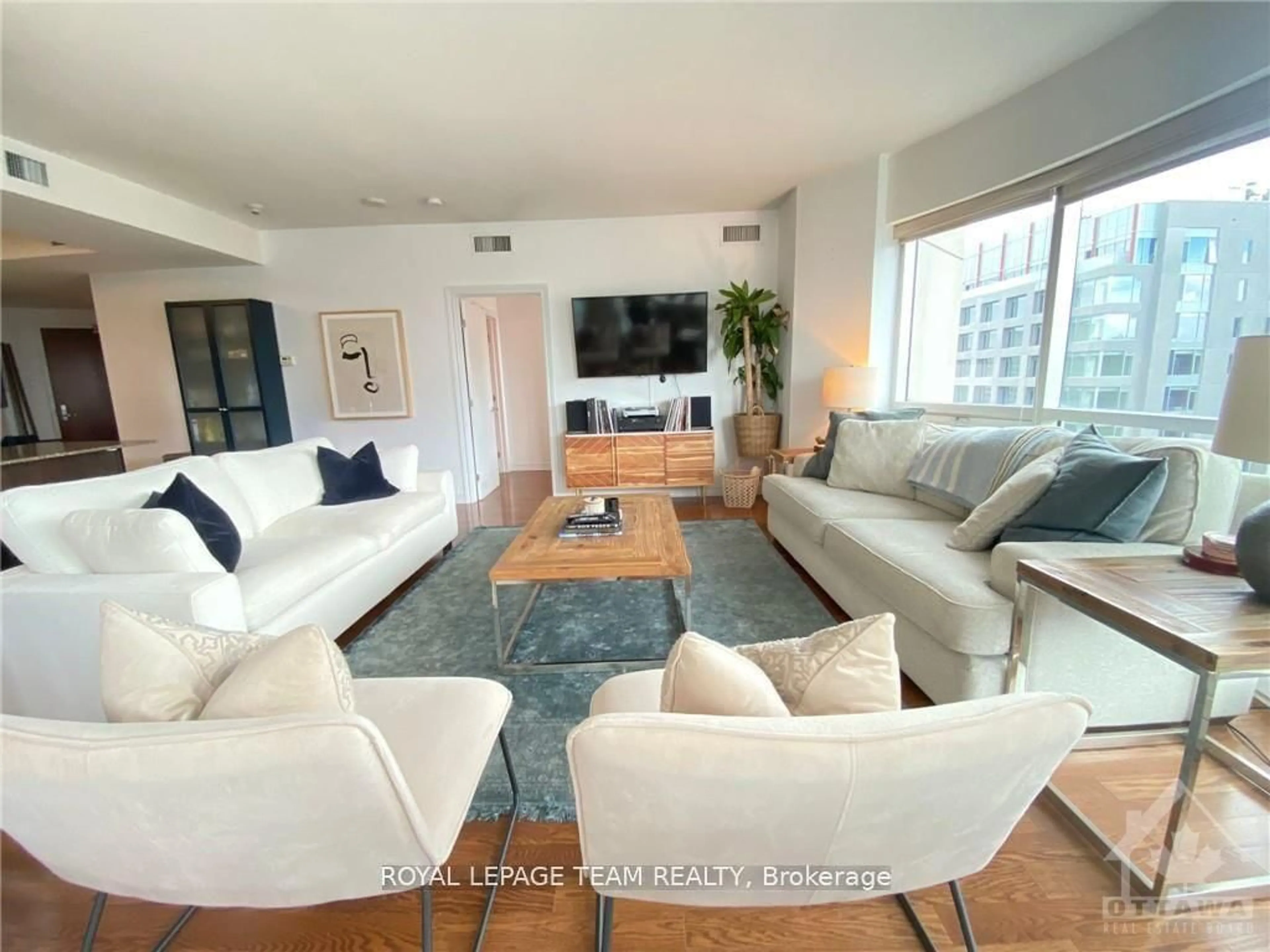 Living room with furniture, unknown for 234 Rideau St #2204, Ottawa Ontario K1N 0A9