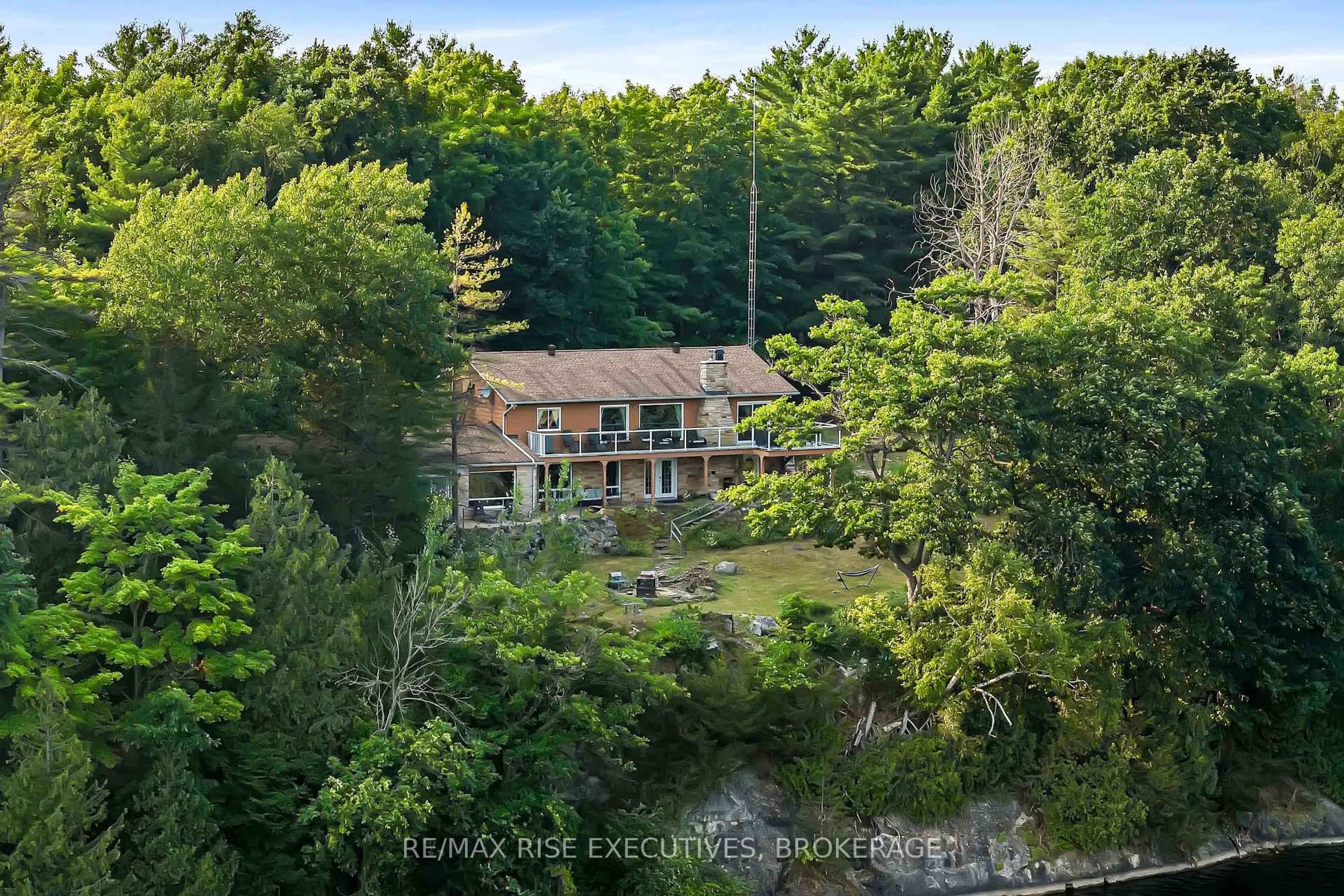 A pic from outside/outdoor area/front of a property/back of a property/a pic from drone, water/lake/river/ocean view for 3376 County Rd 3 Rd, Leeds and the Thousand Islands Ontario K0E 1N0