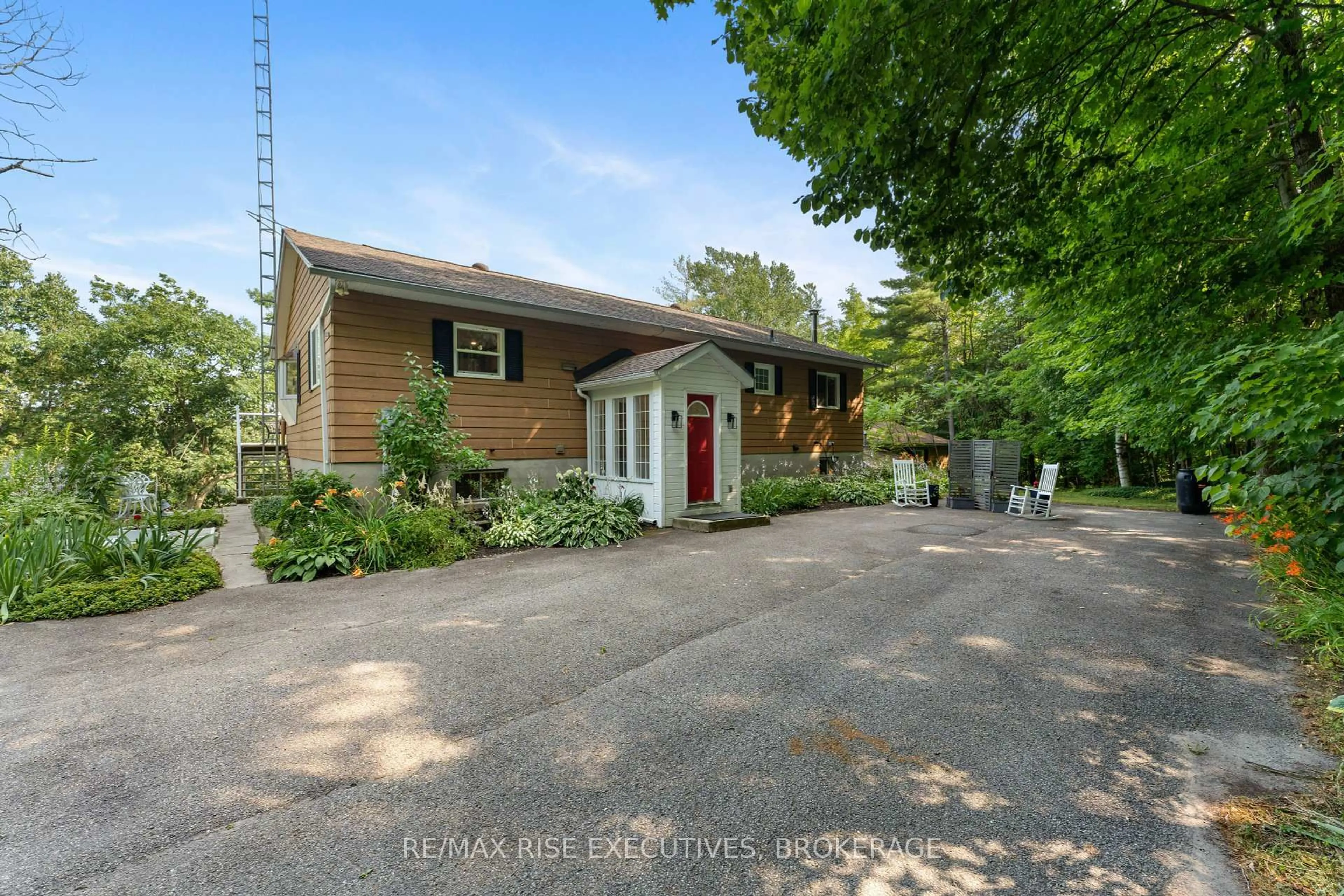 A pic from outside/outdoor area/front of a property/back of a property/a pic from drone, street for 3376 County Rd 3 Rd, Leeds and the Thousand Islands Ontario K0E 1N0
