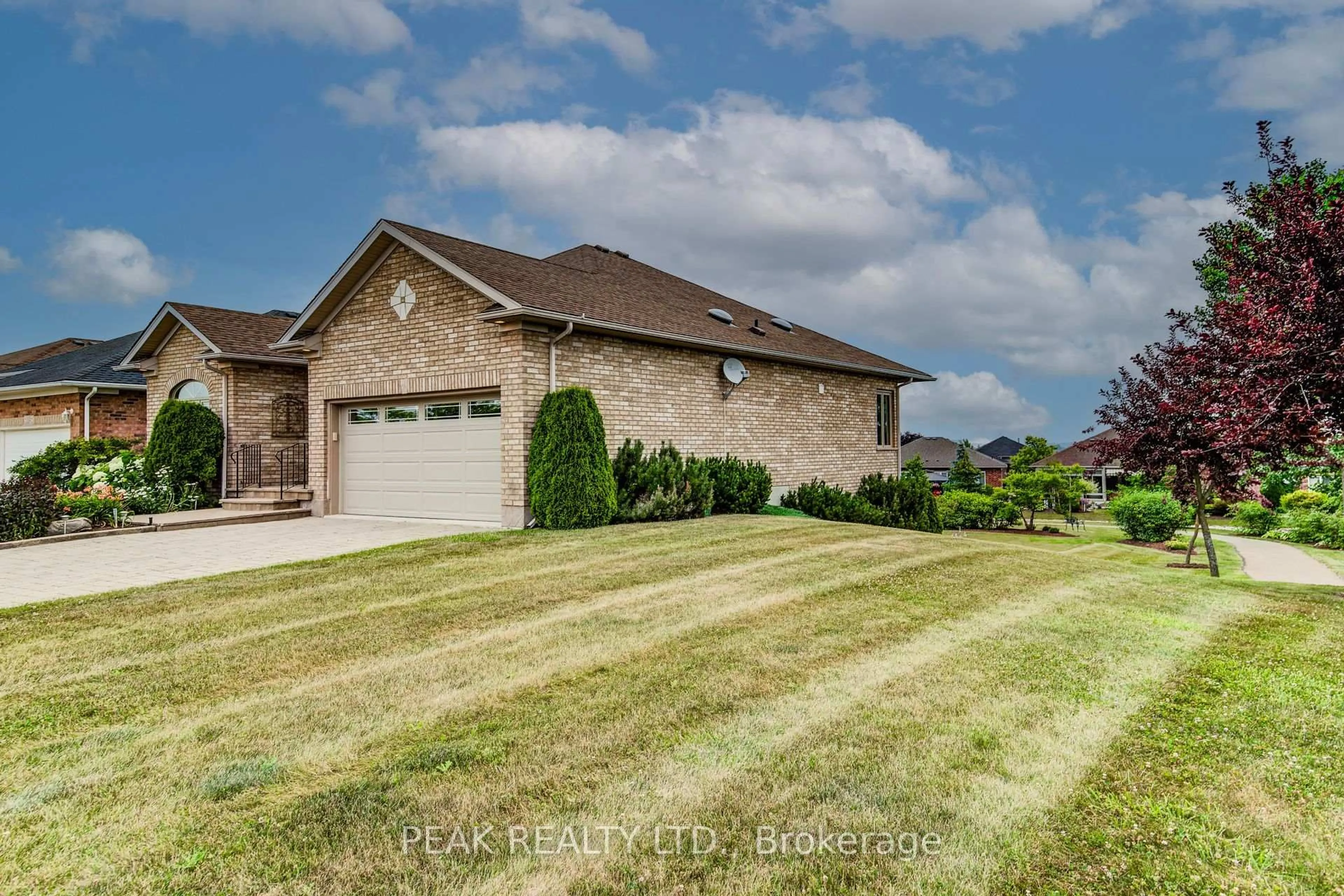 Home with brick exterior material, street for 116 Stonecroft Way, Wilmot Ontario N3A 4L6