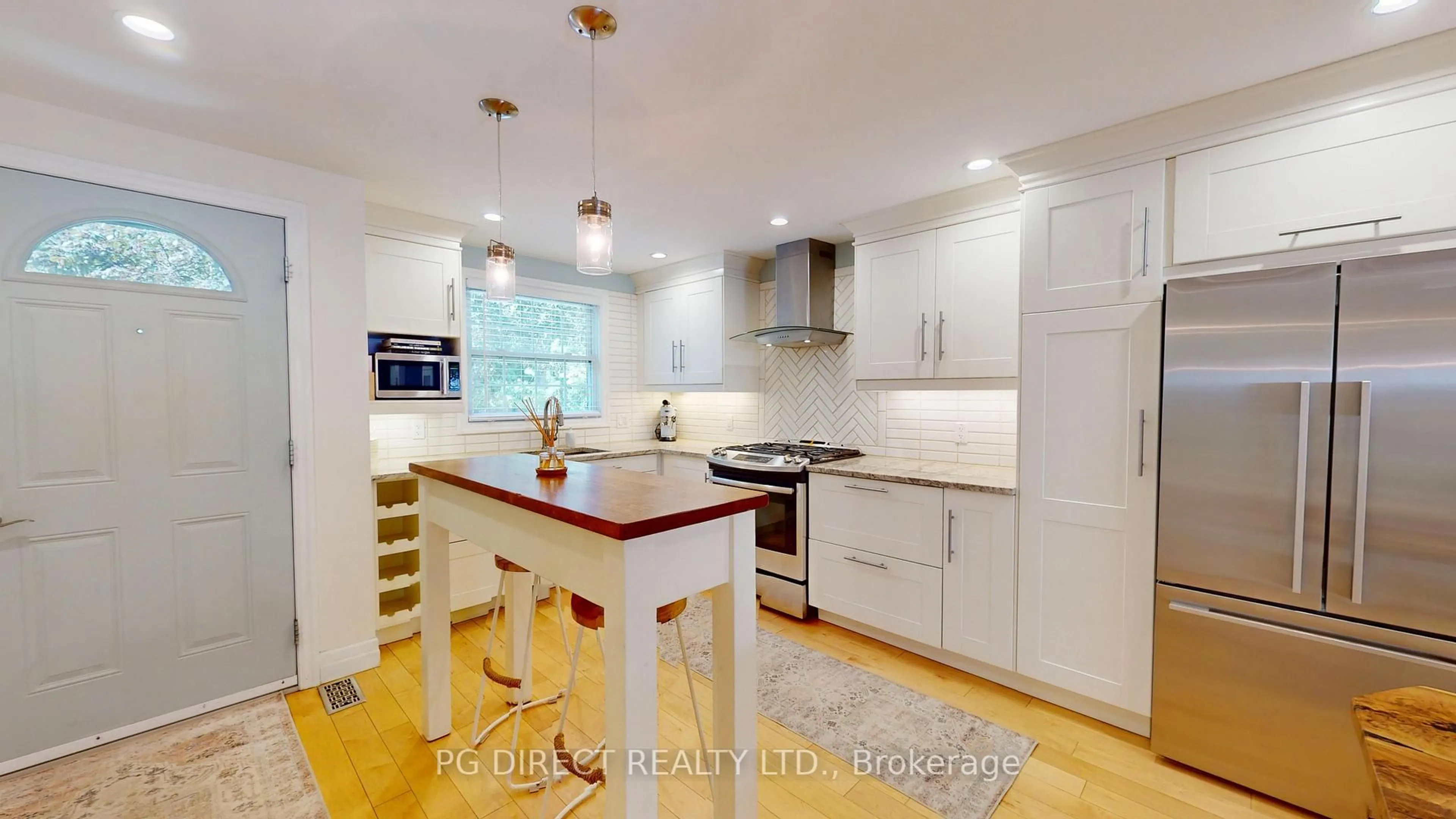 Open concept kitchen, wood/laminate floor for 383 Edinburgh Rd #23, Guelph Ontario N1G 2K7