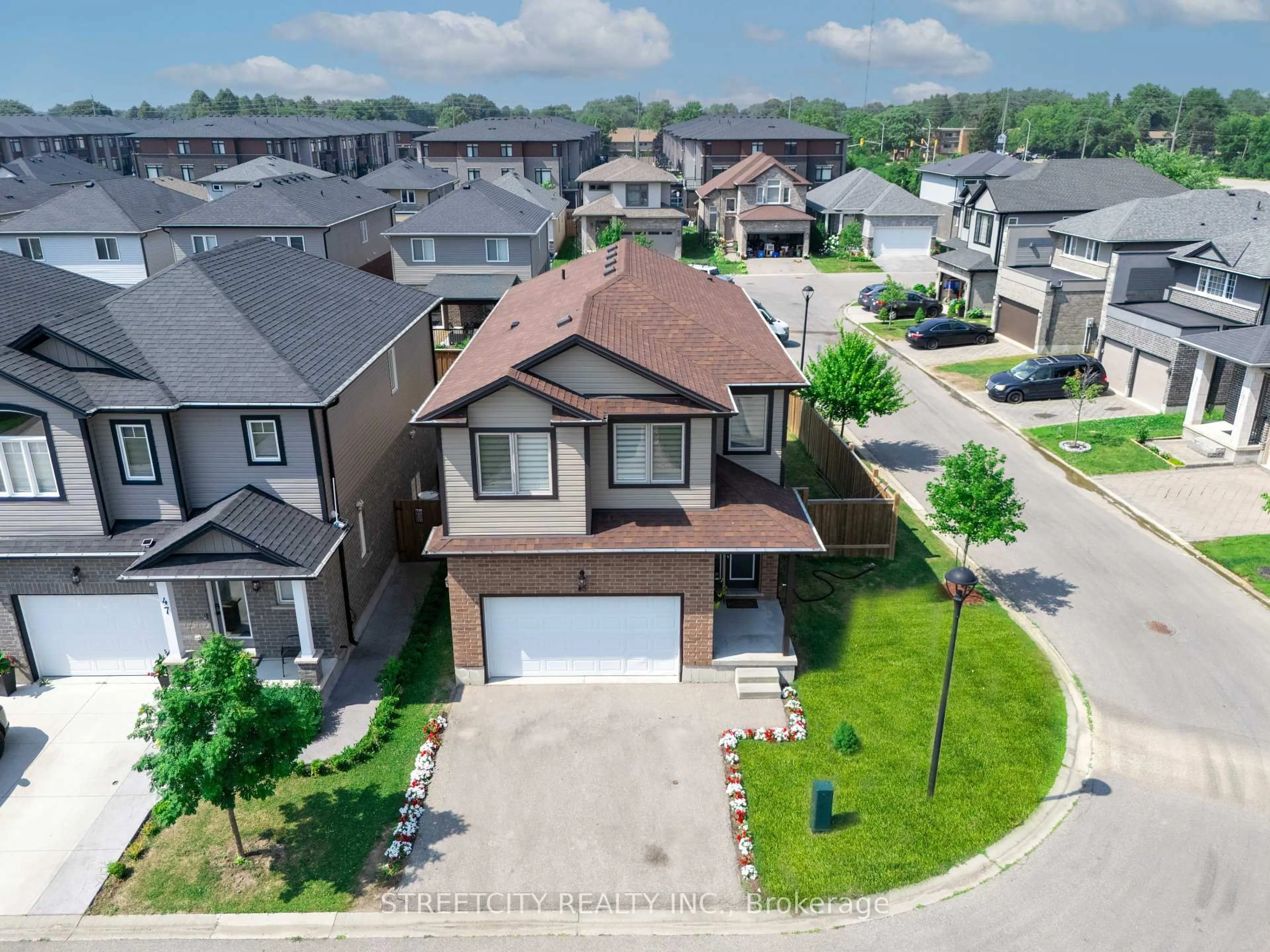 A pic from outside/outdoor area/front of a property/back of a property/a pic from drone, street for 3270 Singleton Ave #45, London South Ontario N6J 2J2