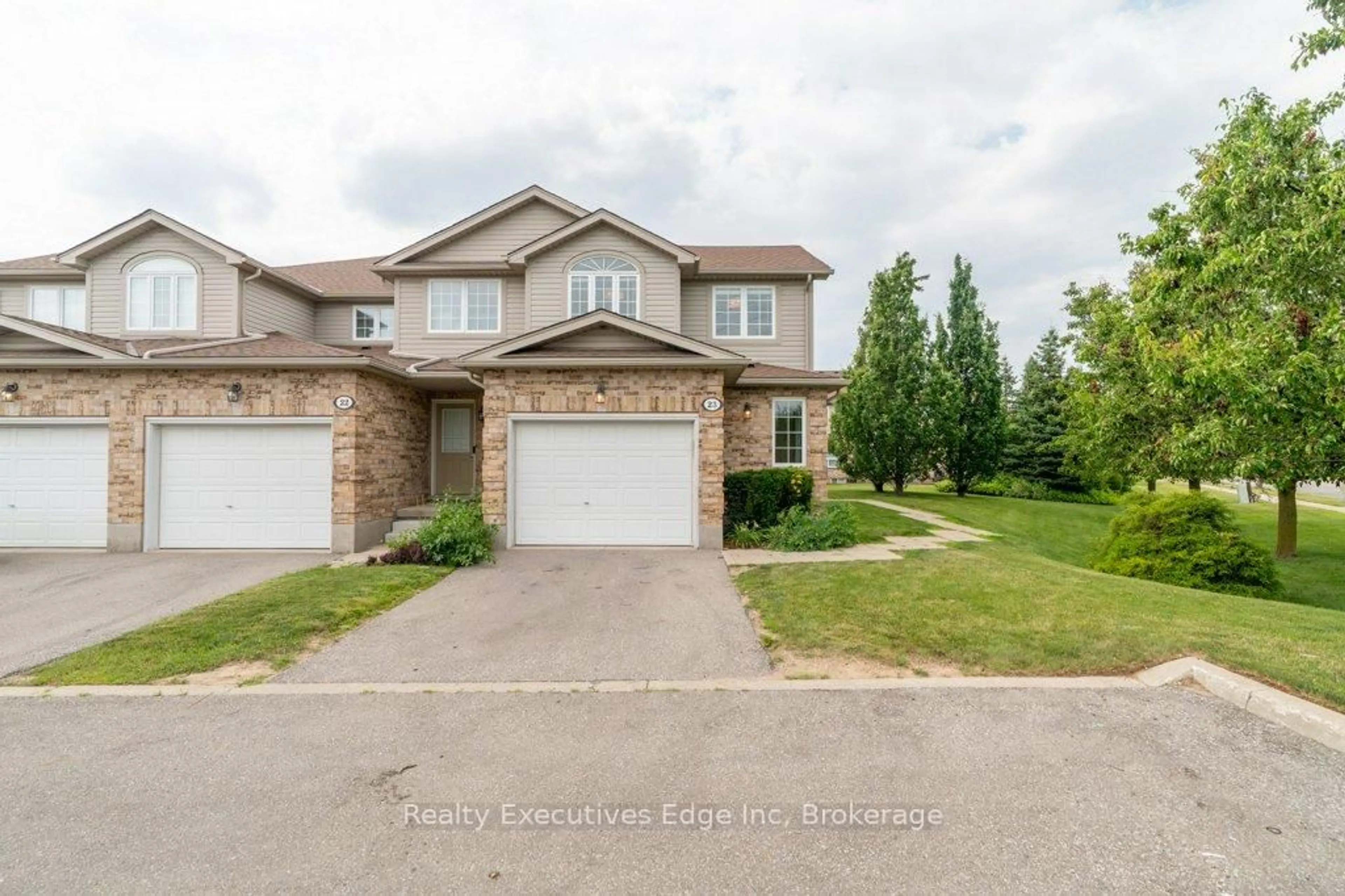 A pic from outside/outdoor area/front of a property/back of a property/a pic from drone, street for 210 Dawn Ave #23, Guelph Ontario N1G 5L5