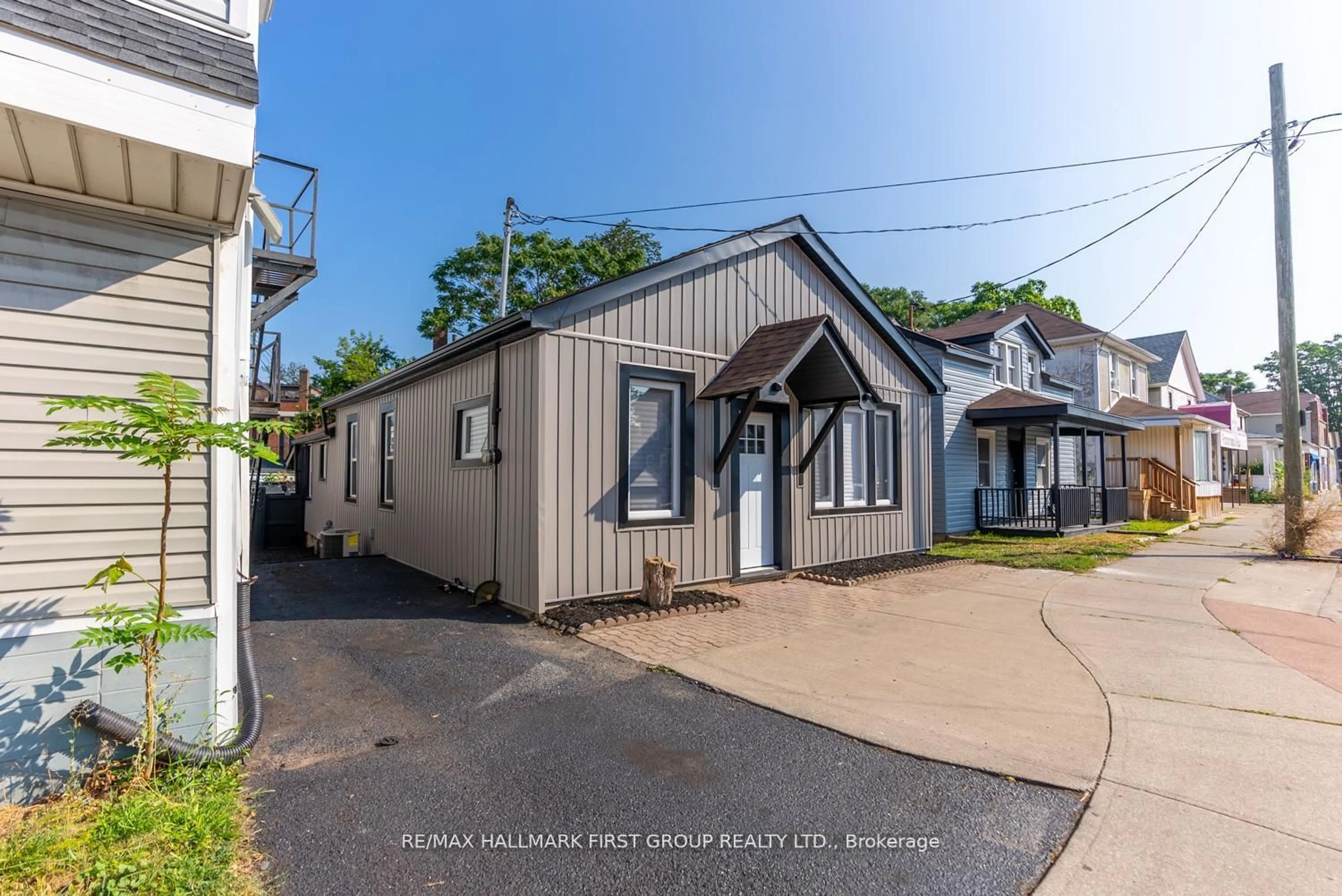 A pic from outside/outdoor area/front of a property/back of a property/a pic from drone, street for 53 Queenston St, St. Catharines Ontario L2R 2Z1