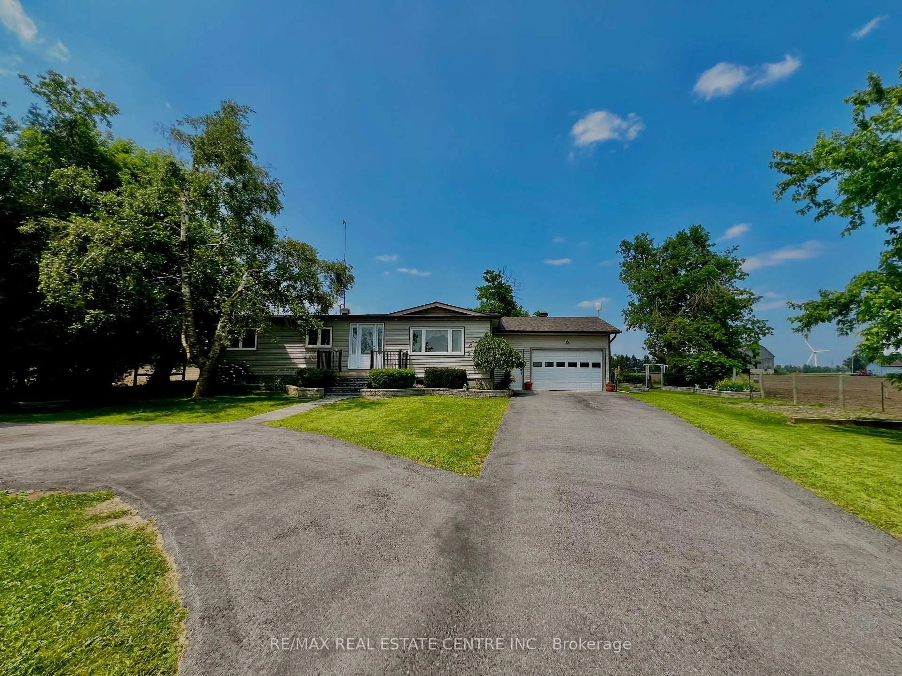 A pic from outside/outdoor area/front of a property/back of a property/a pic from drone, water/lake/river/ocean view for 705409 County Rd 21 Rd, Melancthon Ontario L9V 2A3