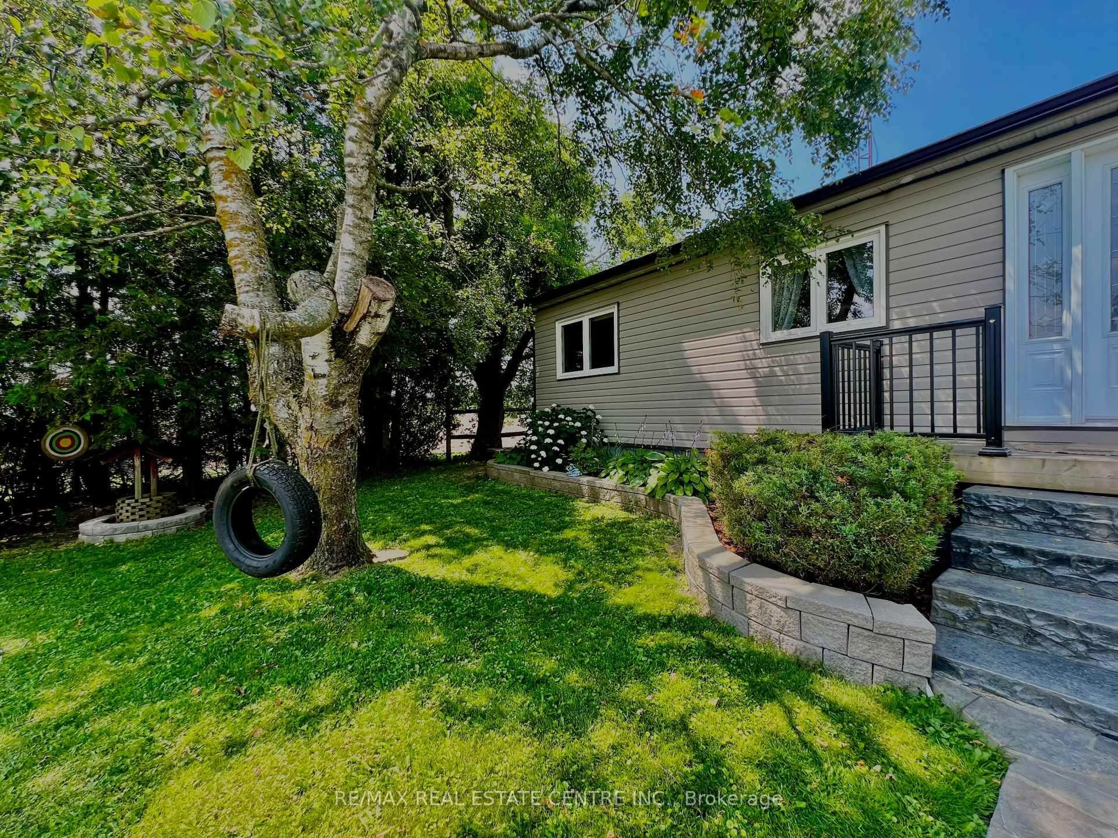 A pic from outside/outdoor area/front of a property/back of a property/a pic from drone, street for 705409 County Rd 21 Rd, Melancthon Ontario L9V 2A3