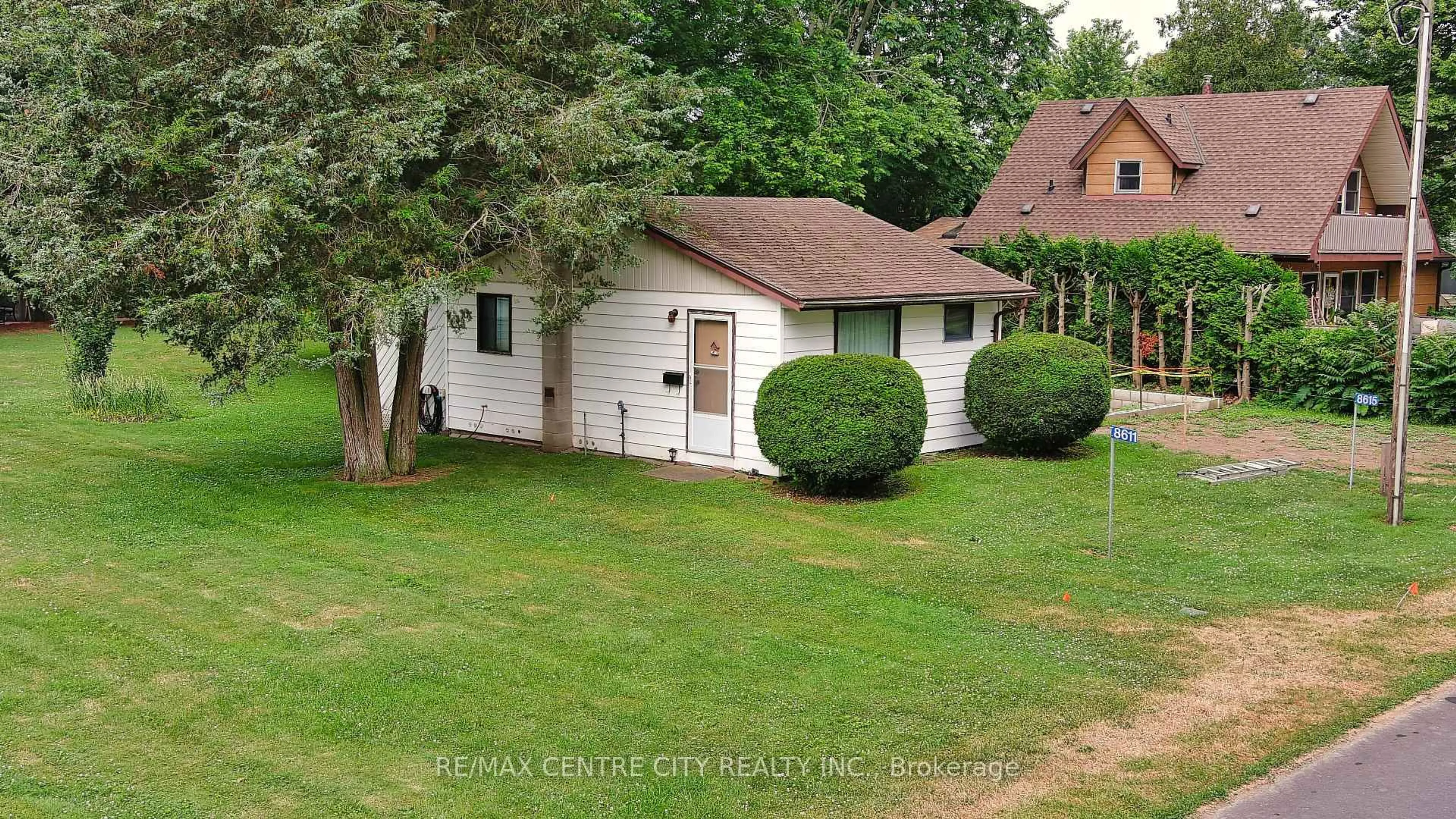 A pic from outside/outdoor area/front of a property/back of a property/a pic from drone, street for 8611 -8615 Furnival Rd, West Elgin Ontario N0L 2C0
