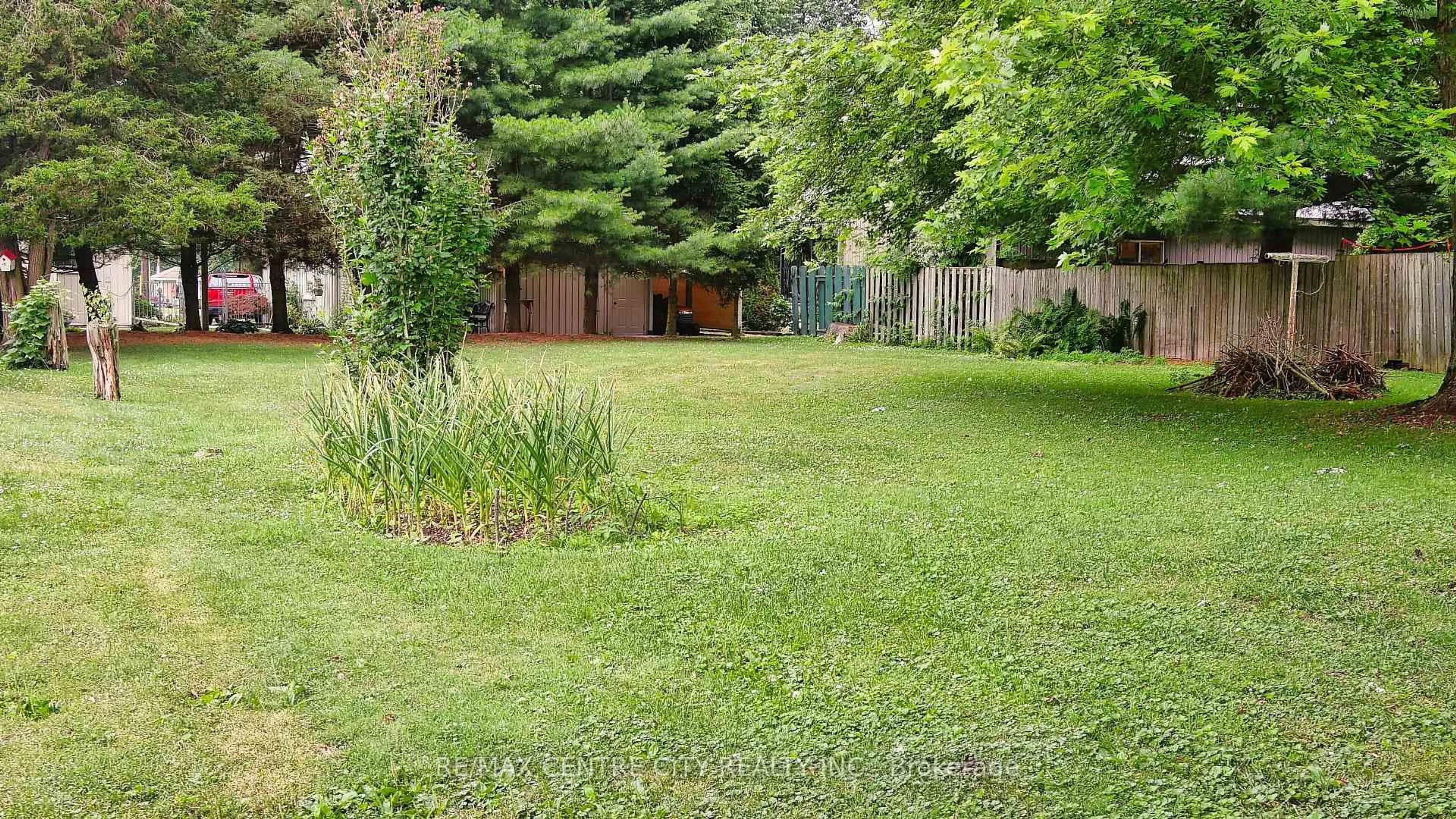 A pic from outside/outdoor area/front of a property/back of a property/a pic from drone, forest/trees view for 8611 -8615 Furnival Rd, West Elgin Ontario N0L 2C0