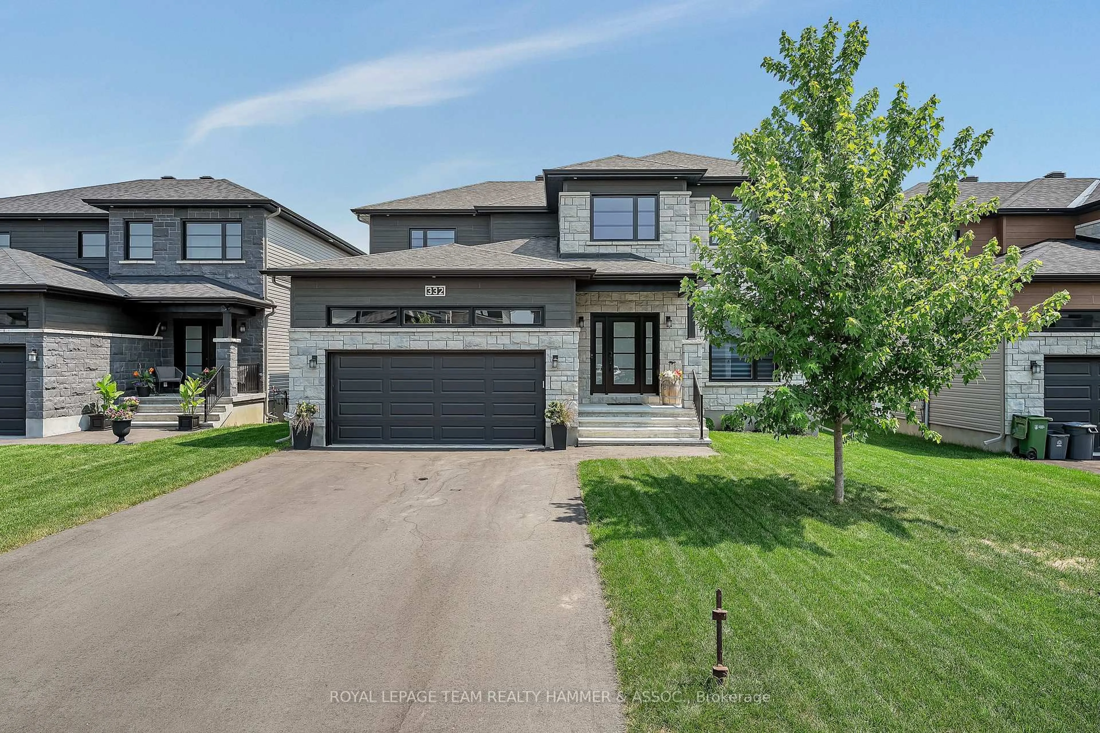 A pic from outside/outdoor area/front of a property/back of a property/a pic from drone, street for 332 Moonlight Dr, Russell Ontario K4R 0L1
