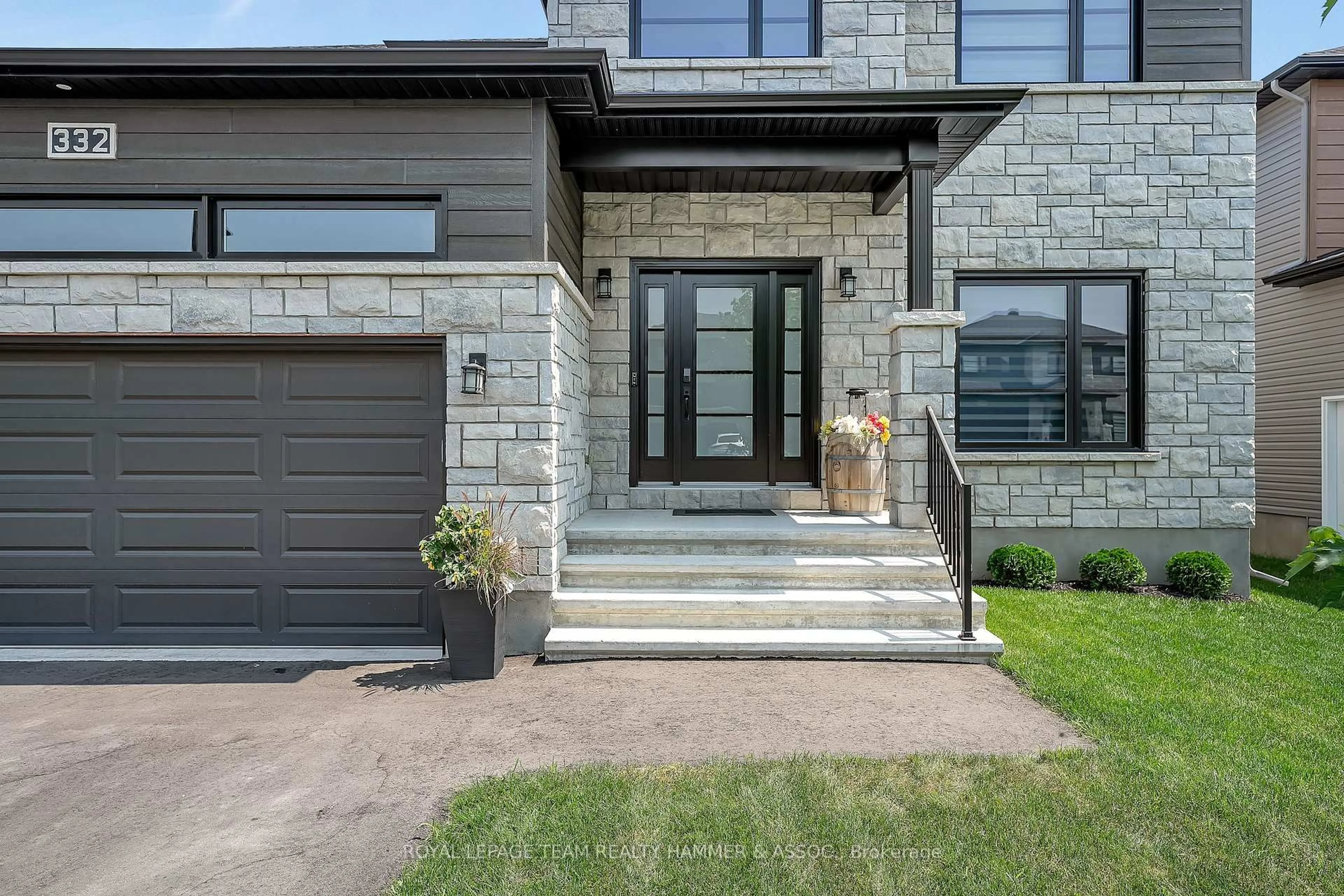 Home with brick exterior material, street for 332 Moonlight Dr, Russell Ontario K4R 0L1