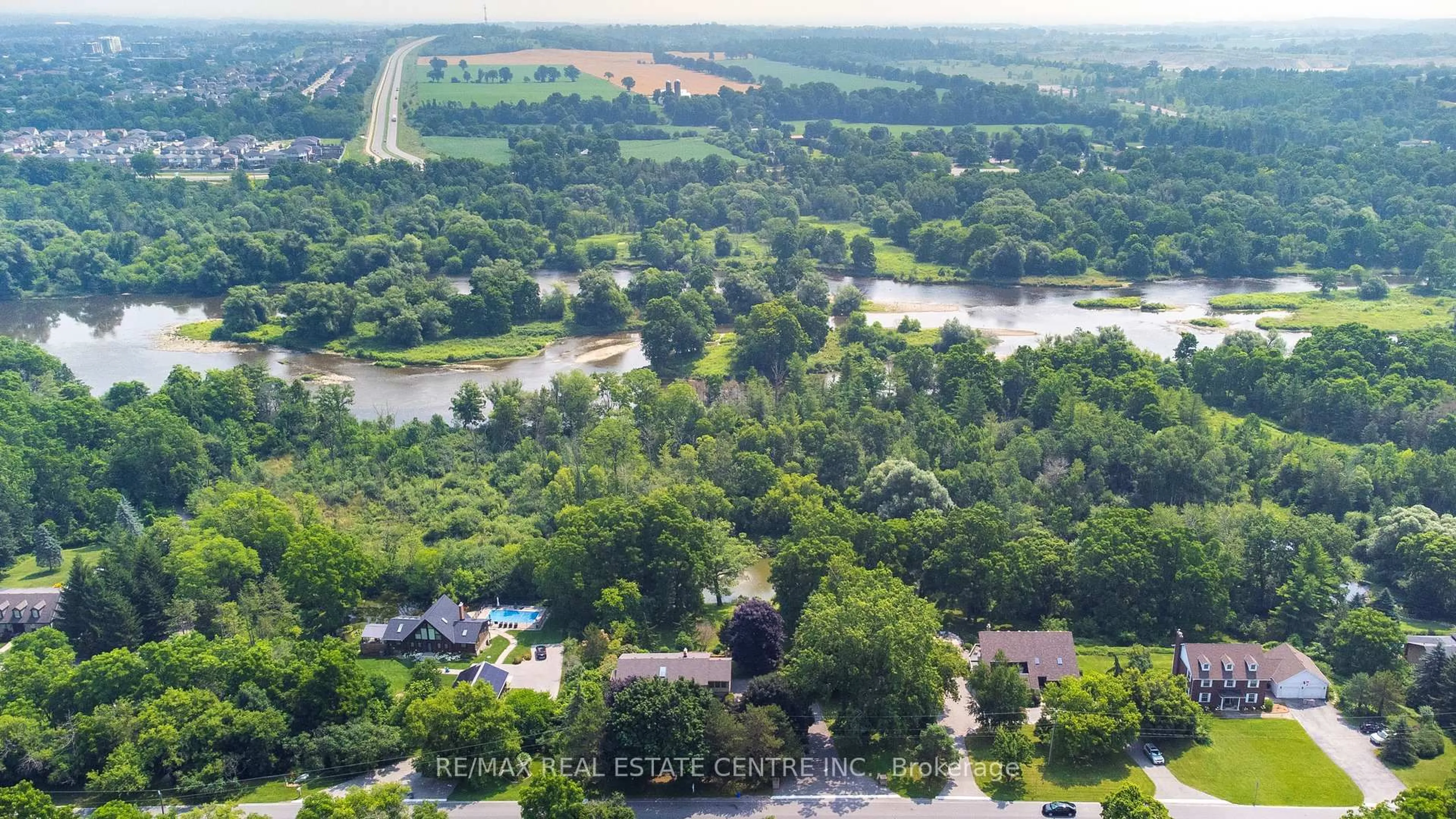 A pic from outside/outdoor area/front of a property/back of a property/a pic from drone, water/lake/river/ocean view for 1023 West River Rd, Cambridge Ontario N1R 5S5
