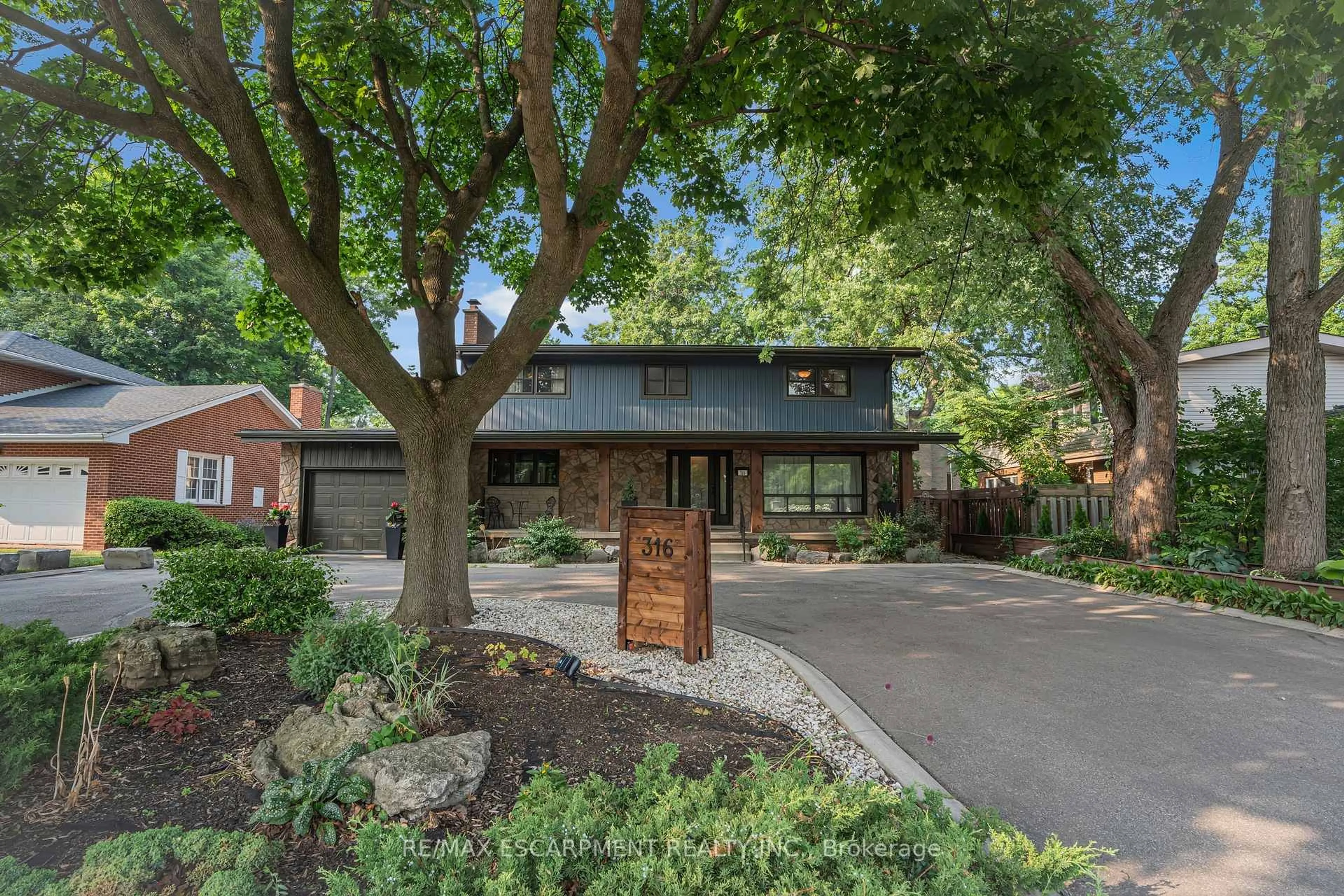 Home with brick exterior material, street for 316 Fennell Ave, Hamilton Ontario L9C 1G4