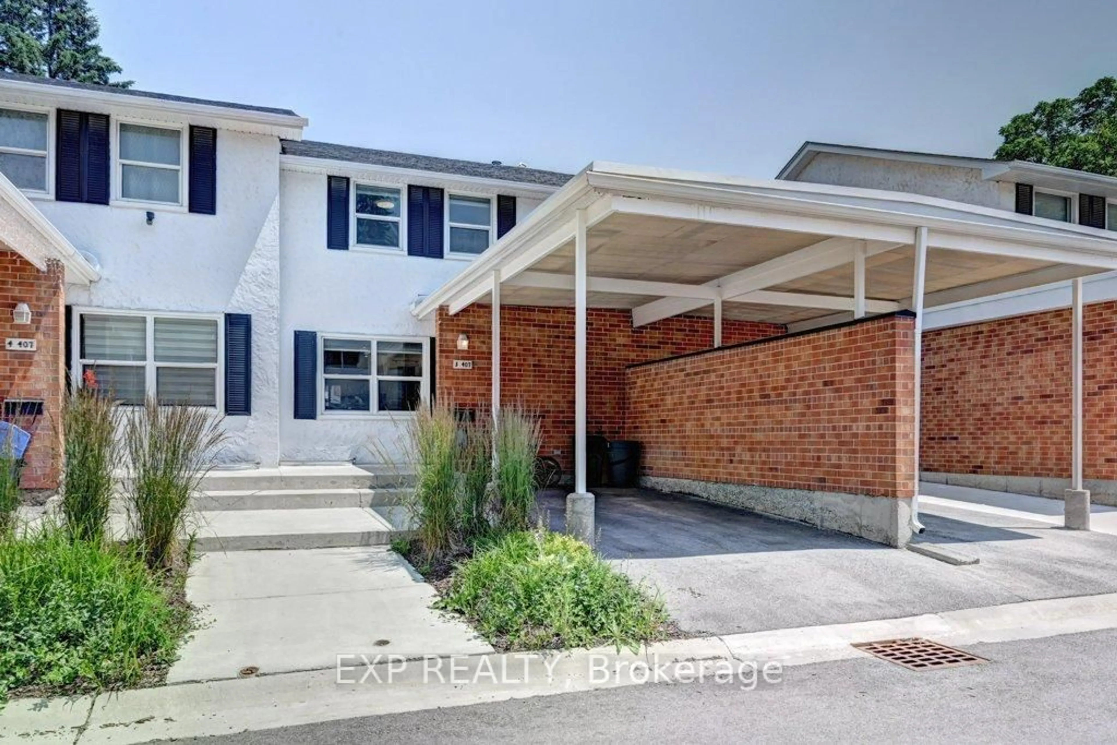 Home with brick exterior material, street for 407 Keats Way #3, Waterloo Ontario N2L 5S7
