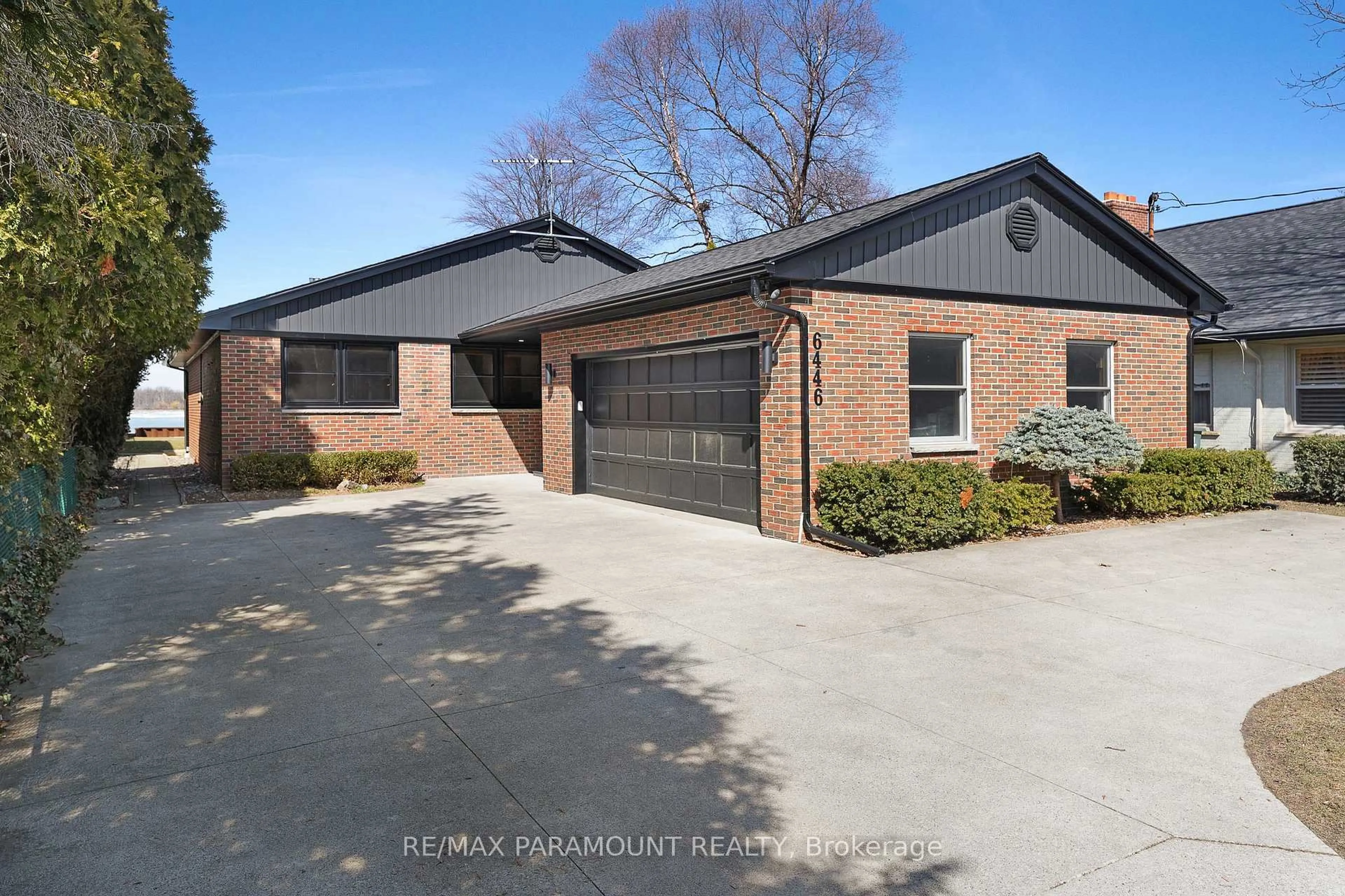 Home with brick exterior material, street for 6446 Riverside Dr, Windsor Ontario N8S 1B9