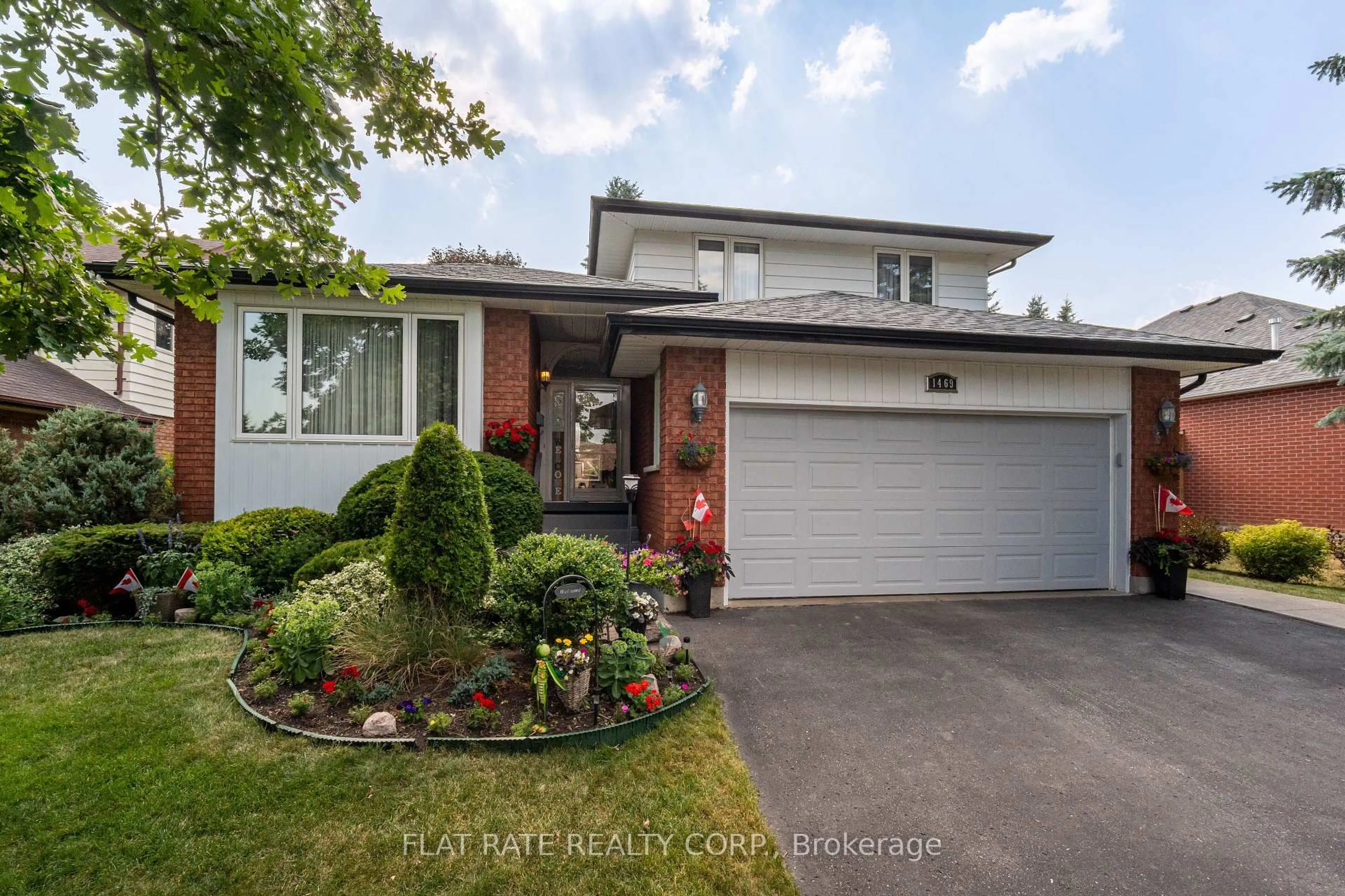 Home with brick exterior material, street for 1469 WILDLARK Dr, Peterborough West Ontario K9K 1X4