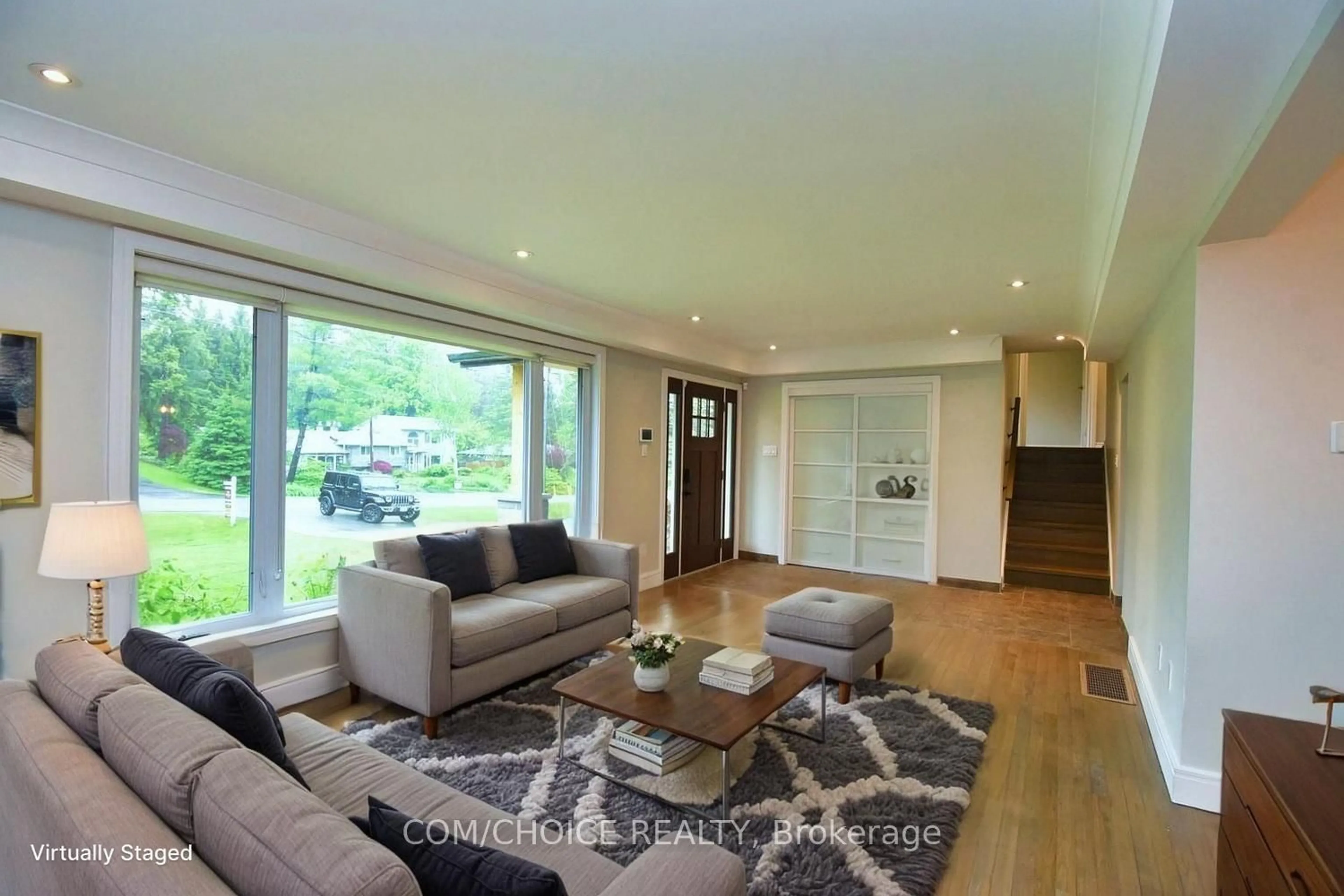 Living room with furniture, wood/laminate floor for 6 Johnston Ave, Hamilton Ontario L9H 5E3