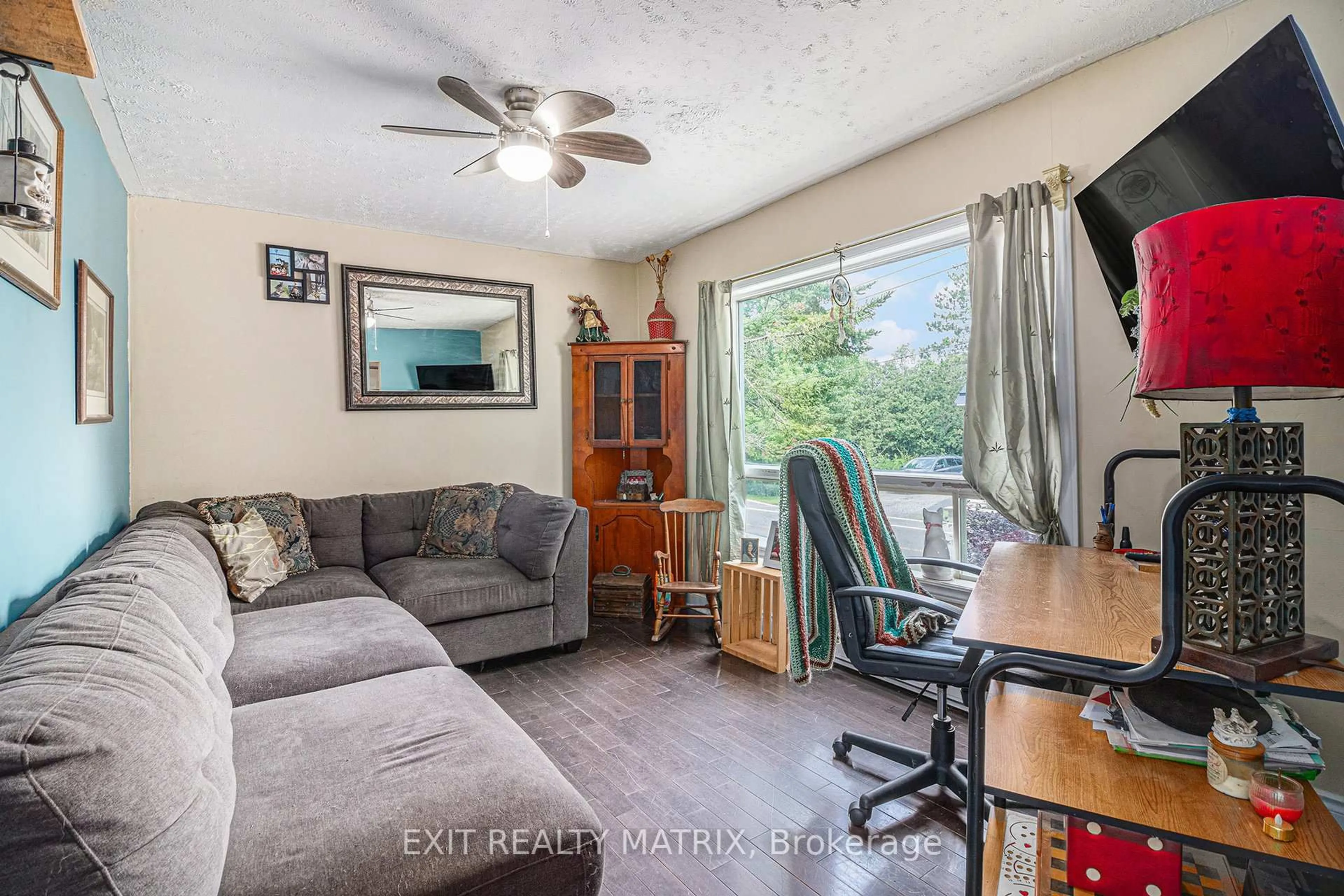 Living room with furniture, wood/laminate floor for 3164 County 15 Rd, The Nation Ontario K0B 1G0