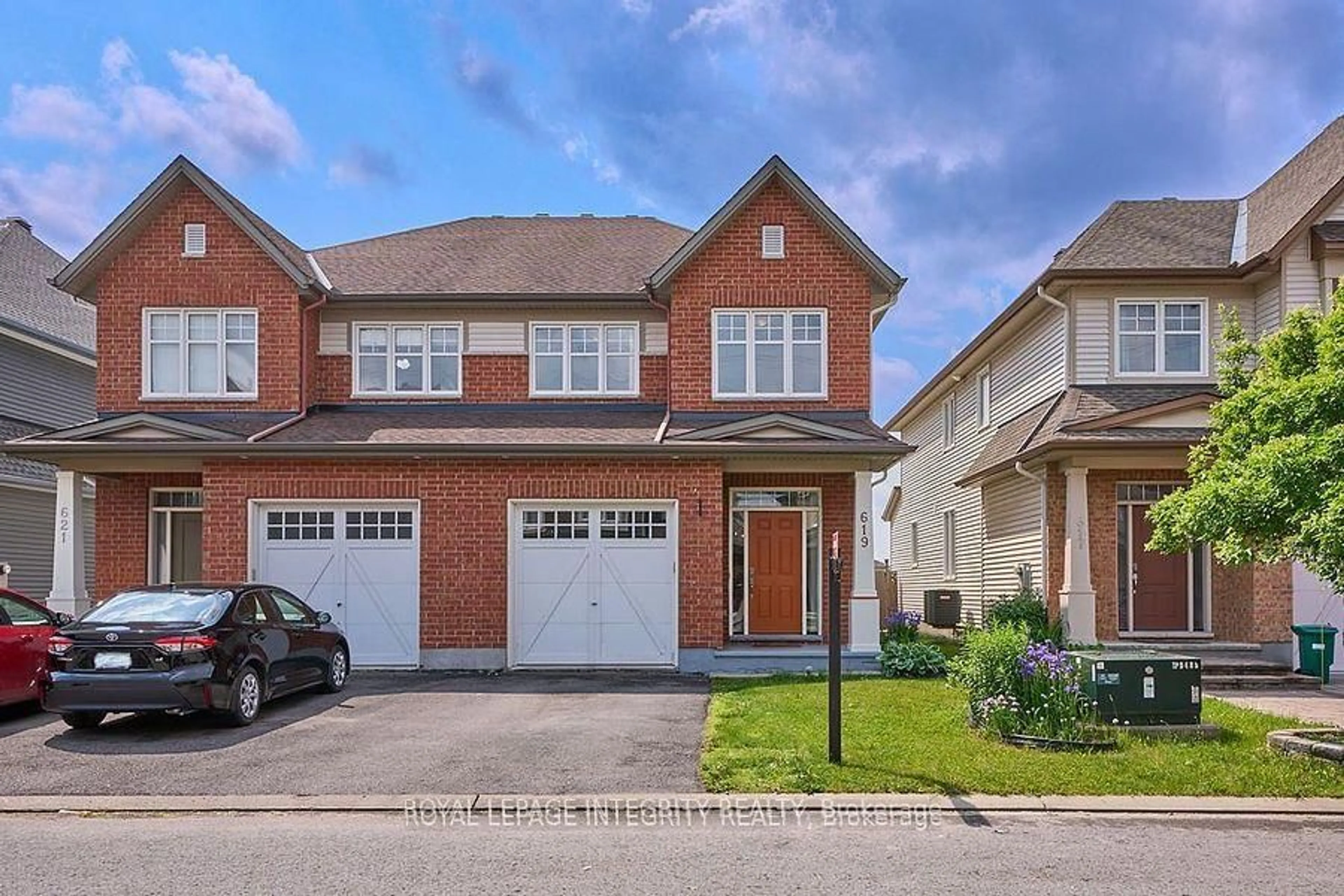 Home with brick exterior material, street for 619 Moorpark Ave, Ottawa Ontario K2M 0B6