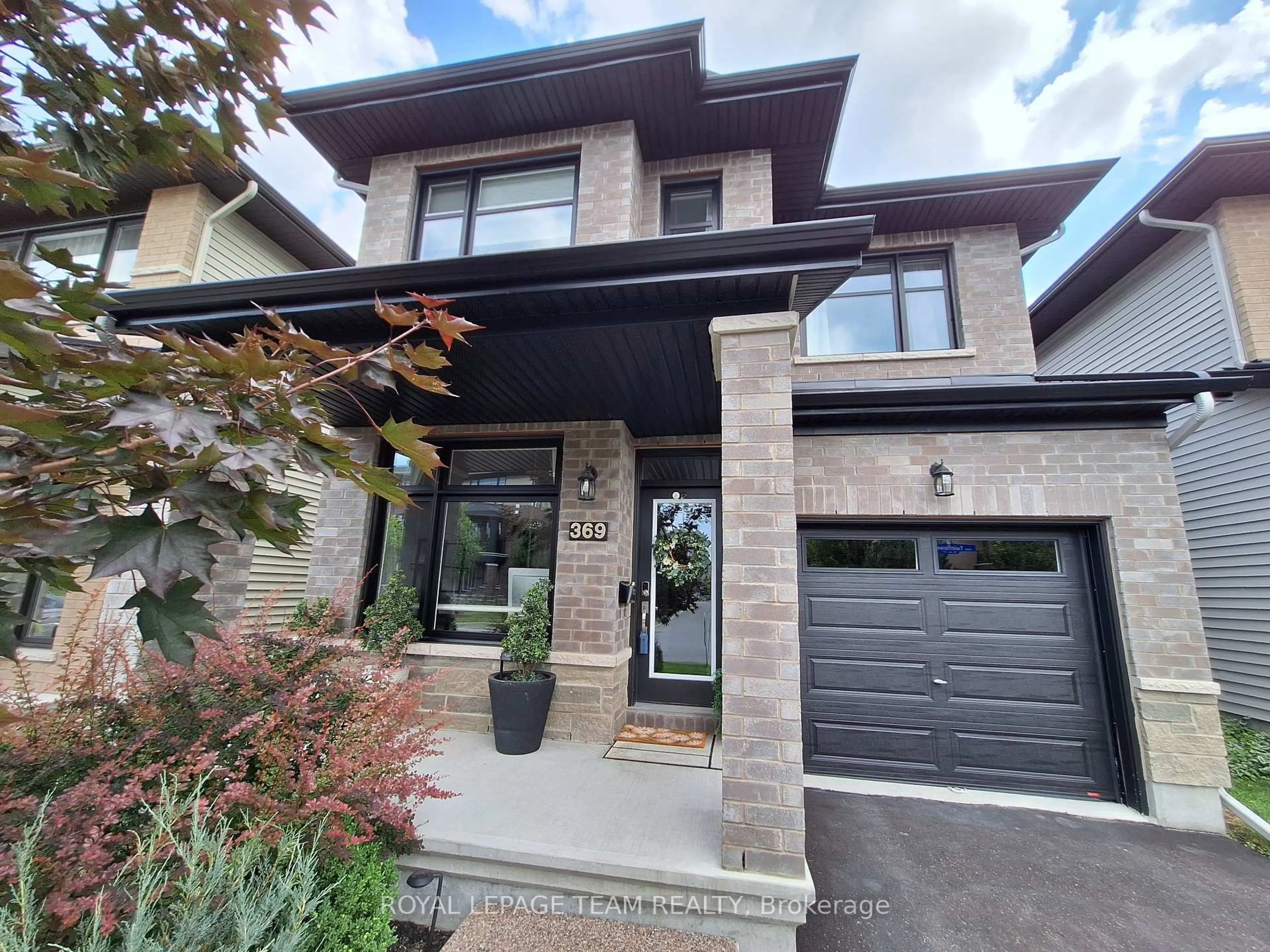 Home with brick exterior material, street for 369 Twinflower Way, Ottawa Ontario K2J 5Z5