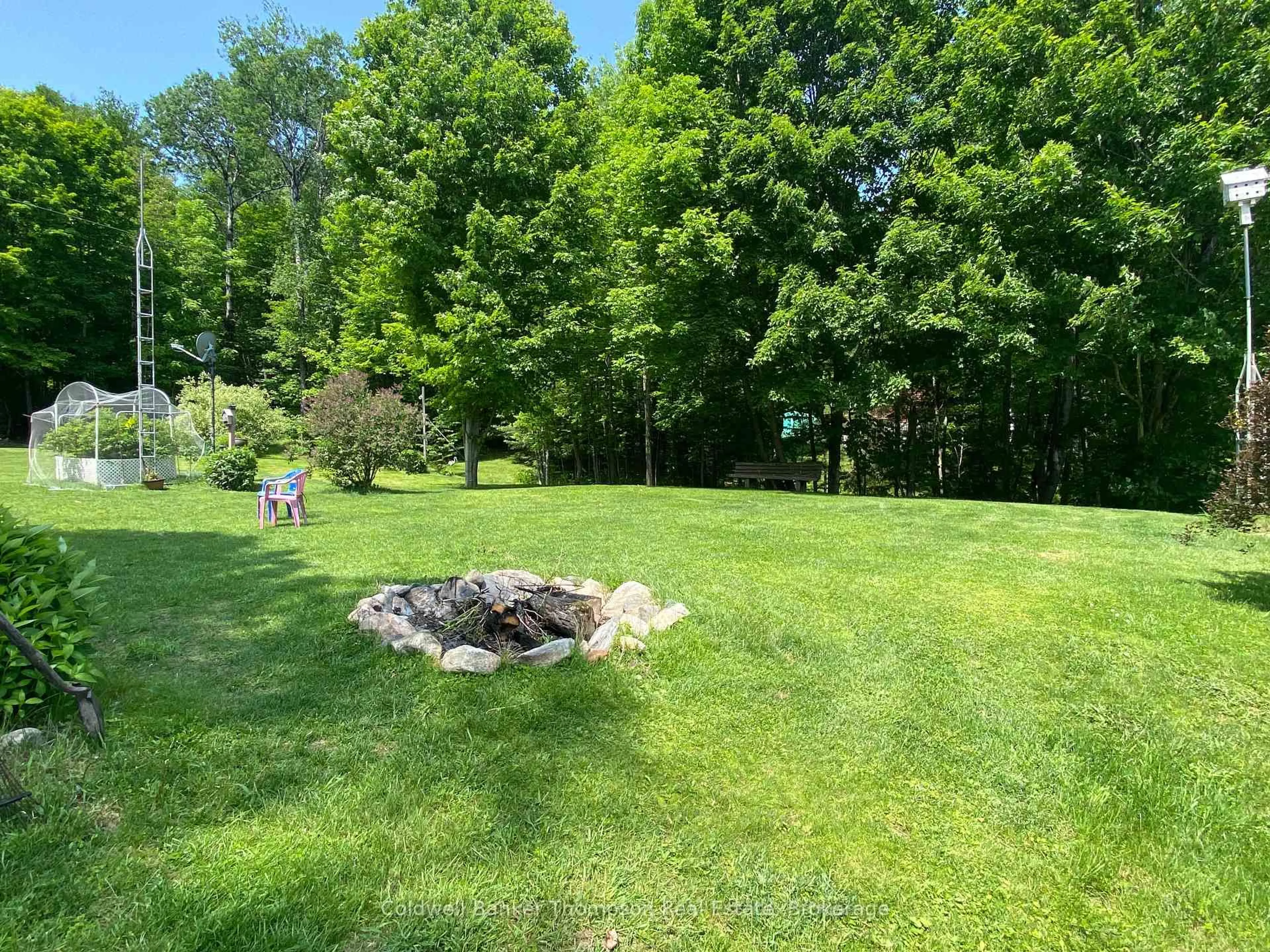 A pic from outside/outdoor area/front of a property/back of a property/a pic from drone, forest/trees view for 175 West Point Dr, Armour Ontario P0A 1C0