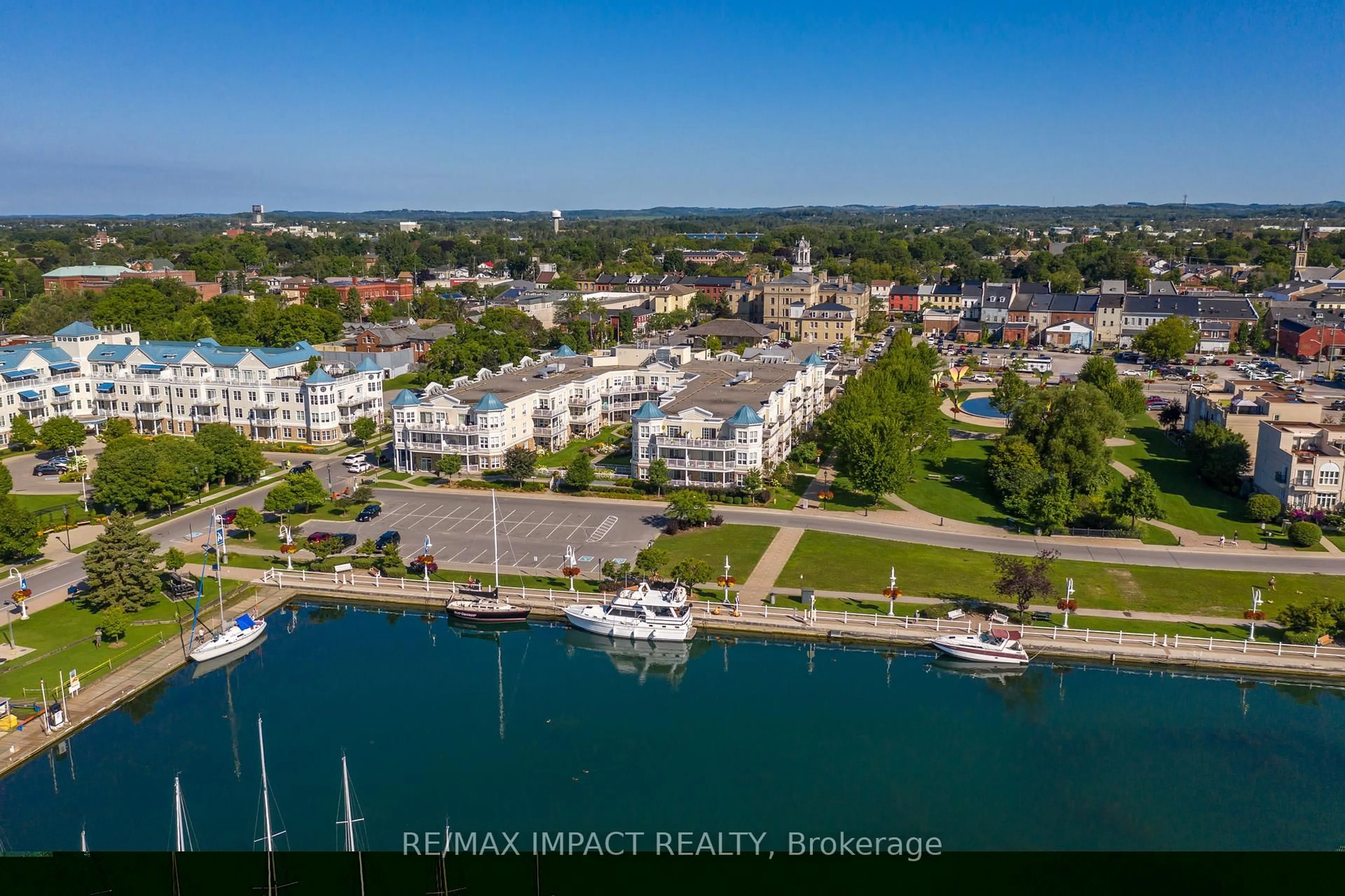 A pic from outside/outdoor area/front of a property/back of a property/a pic from drone, water/lake/river/ocean view for 148 Third St #222, Cobourg Ontario K9A 5X2