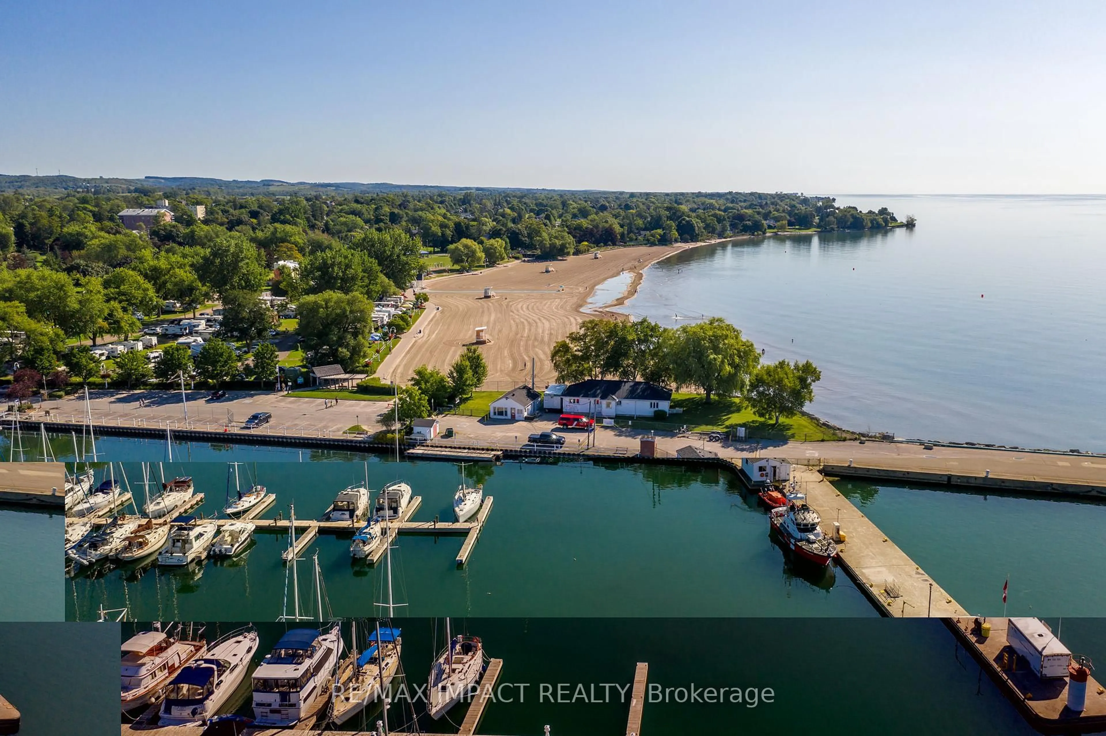 A pic from outside/outdoor area/front of a property/back of a property/a pic from drone, water/lake/river/ocean view for 148 Third St #222, Cobourg Ontario K9A 5X2