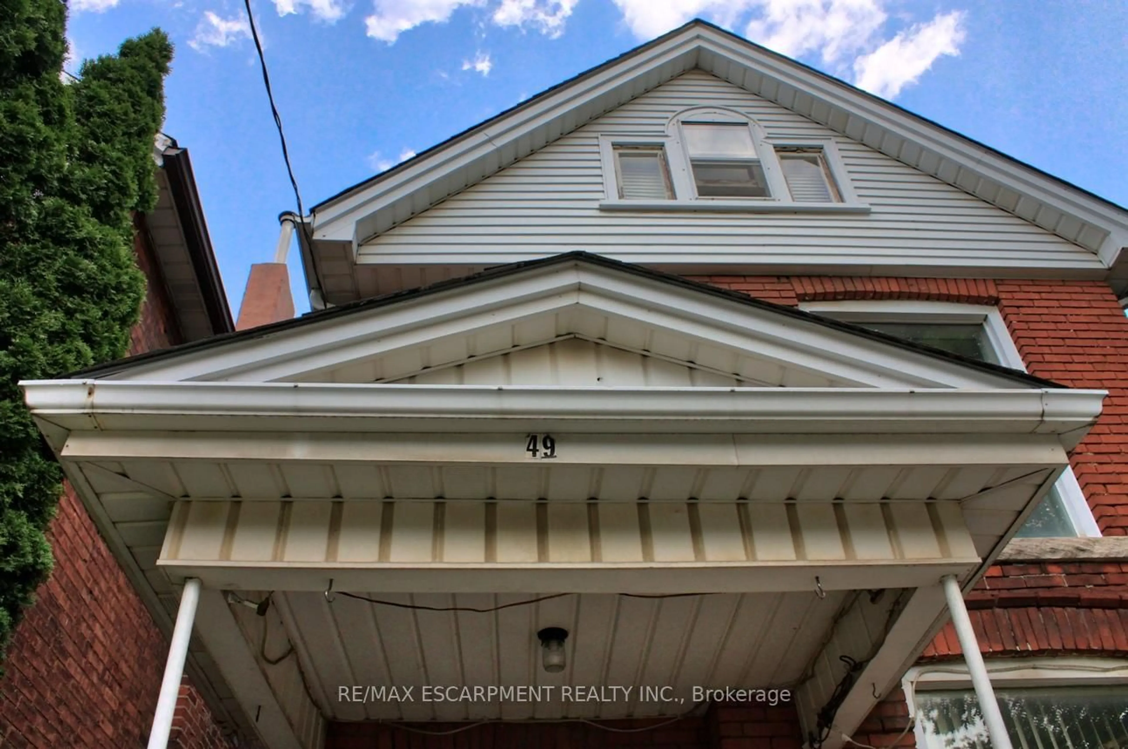 Home with vinyl exterior material, street for 49 Nightingale St, Hamilton Ontario L8L 1R7