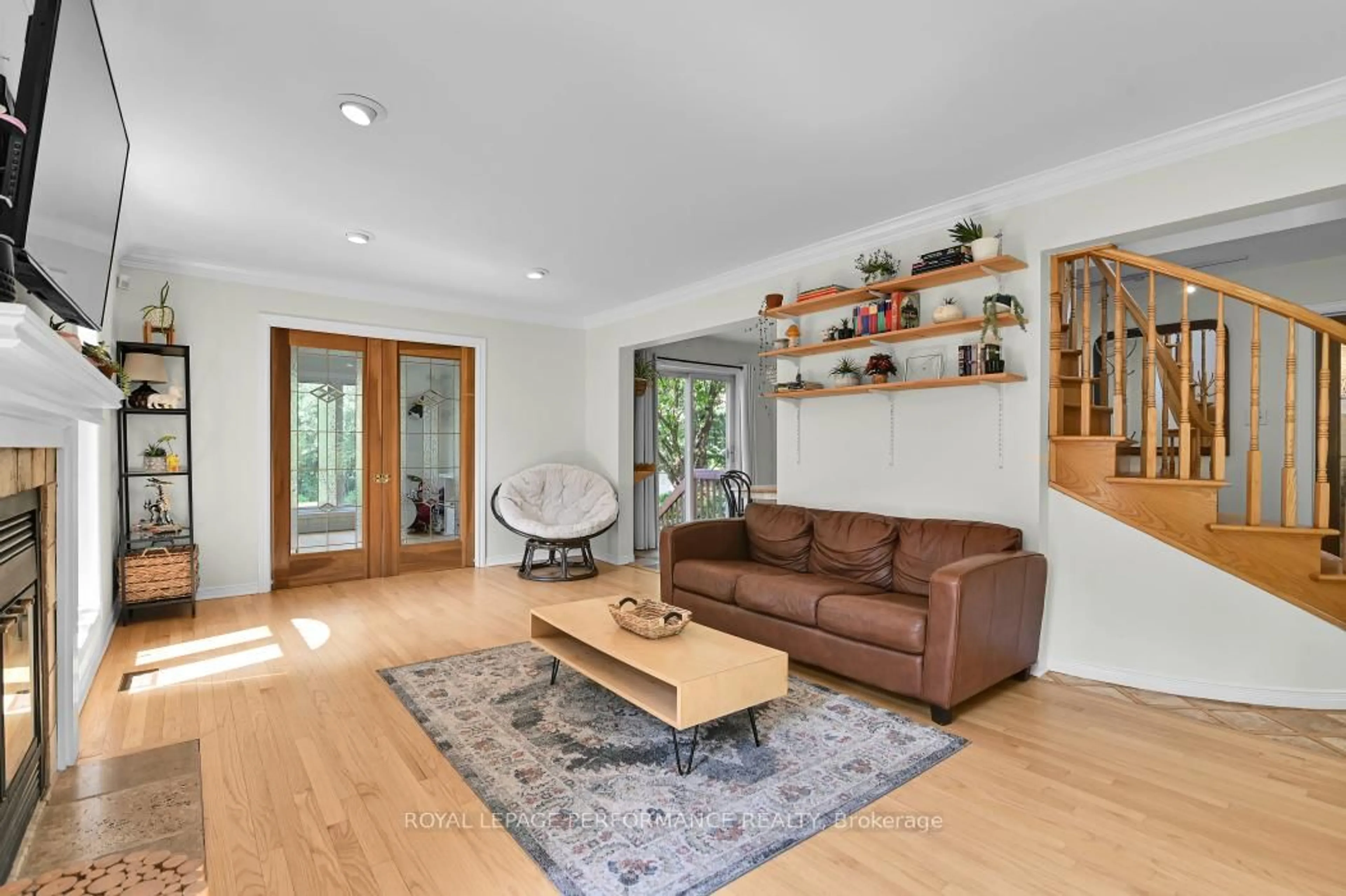 Living room with furniture, wood/laminate floor for 2057 Clark Rd, Clarence-Rockland Ontario K4K 1K7