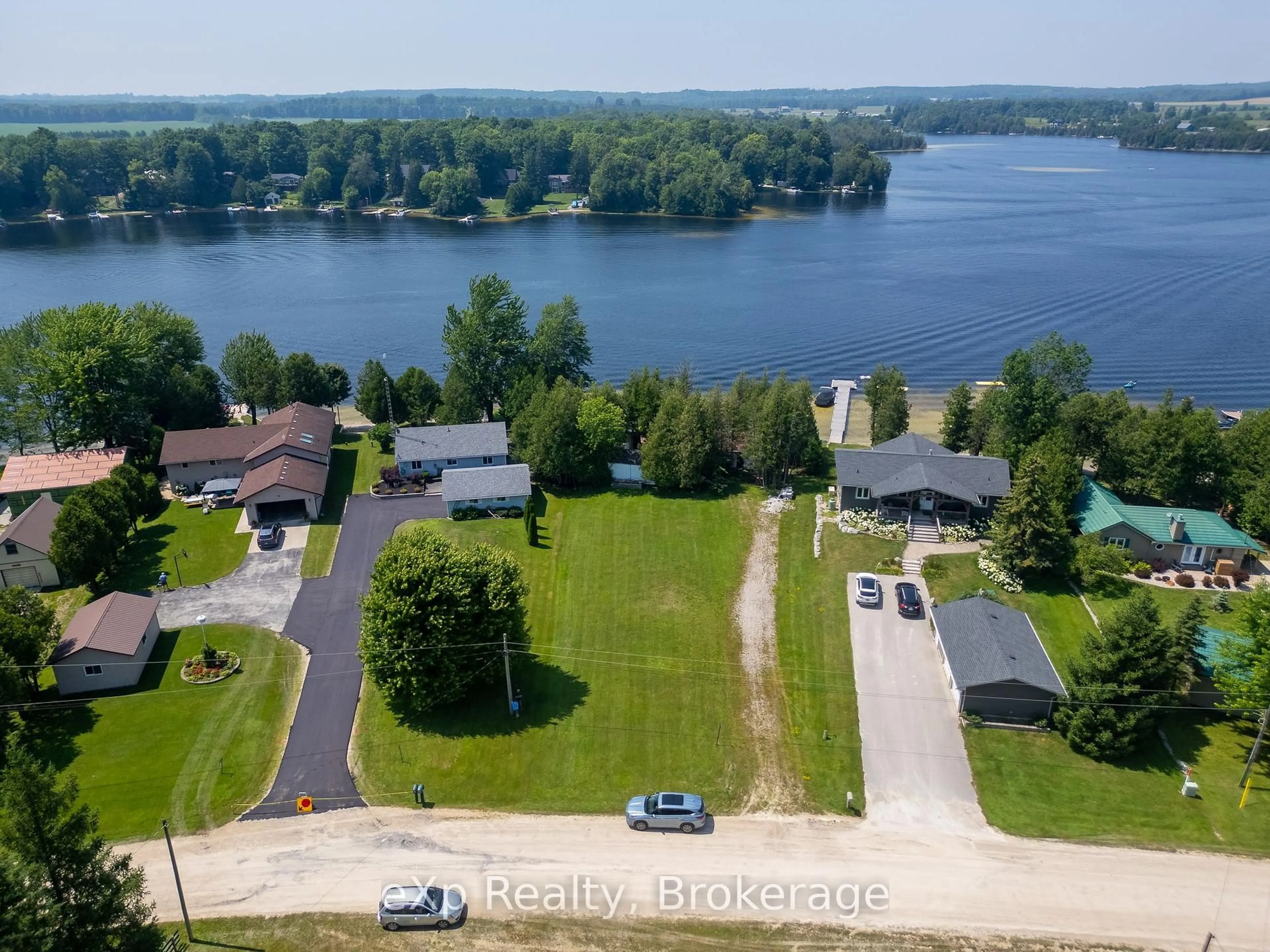 A pic from outside/outdoor area/front of a property/back of a property/a pic from drone, water/lake/river/ocean view for 204 McCullough Lake Dr, Chatsworth Ontario N0H 2V0