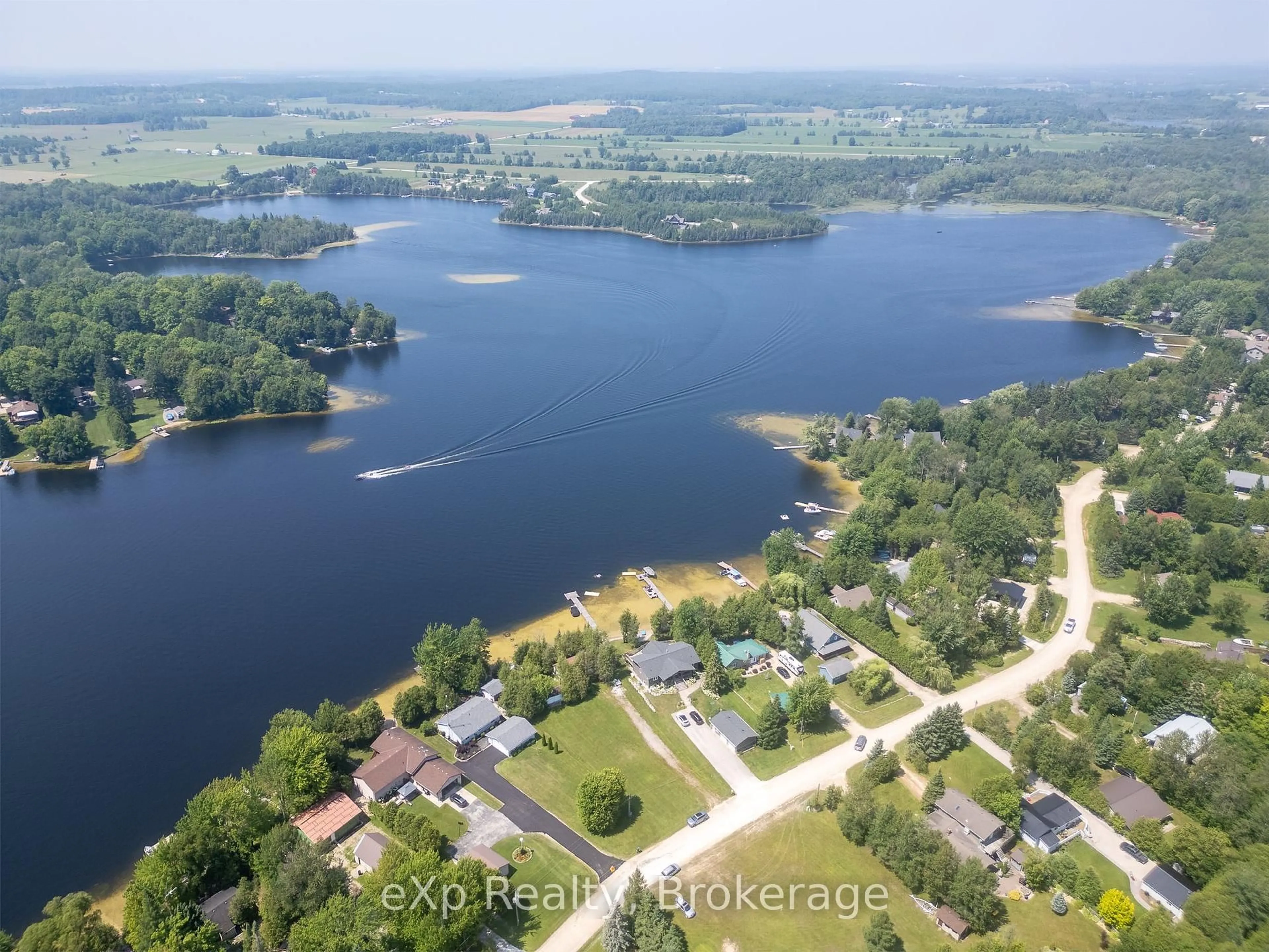 A pic from outside/outdoor area/front of a property/back of a property/a pic from drone, water/lake/river/ocean view for 204 McCullough Lake Dr, Chatsworth Ontario N0H 2V0