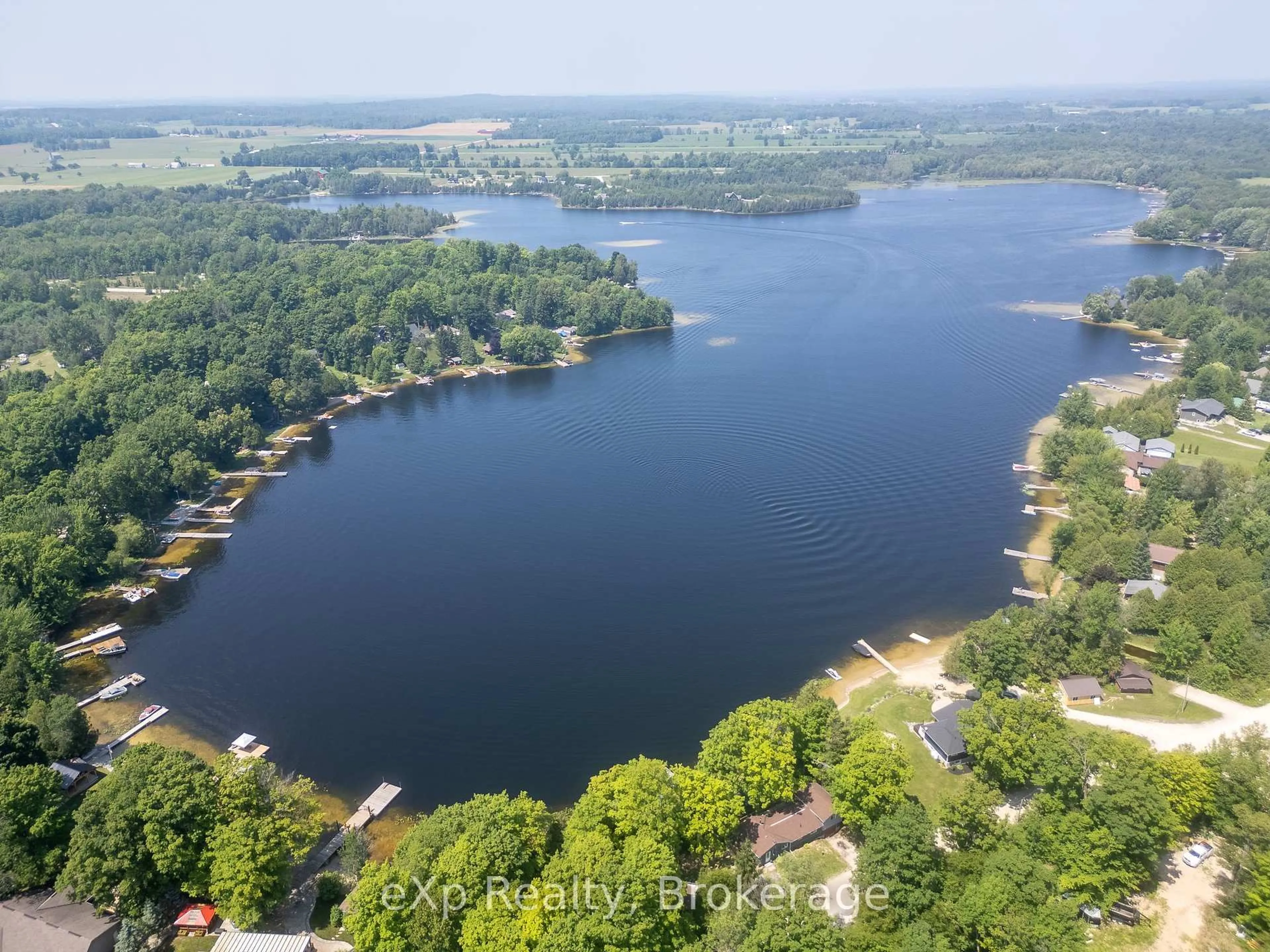 A pic from outside/outdoor area/front of a property/back of a property/a pic from drone, water/lake/river/ocean view for 204 McCullough Lake Dr, Chatsworth Ontario N0H 2V0